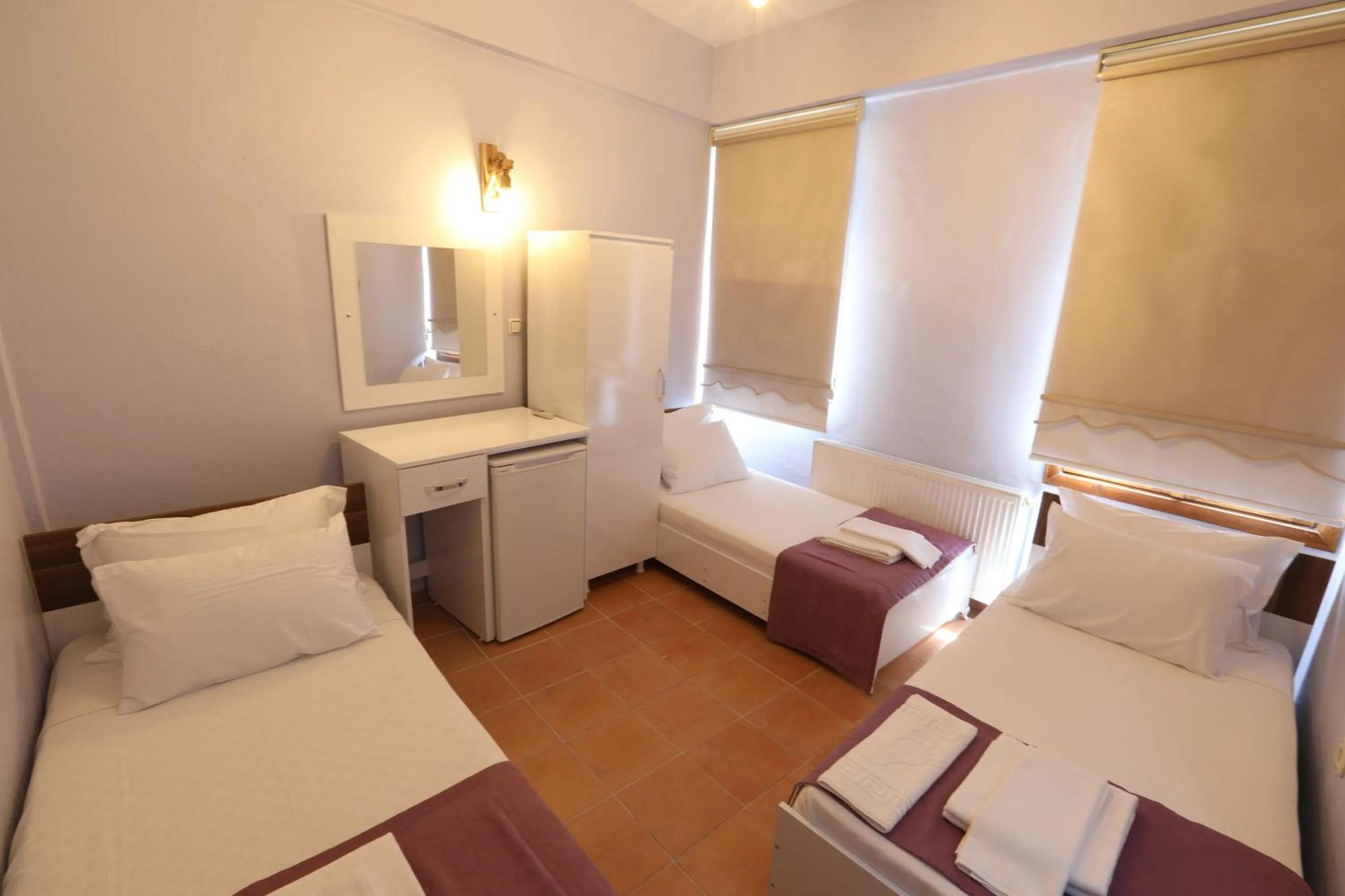 Bed in Cunda Pera Otel