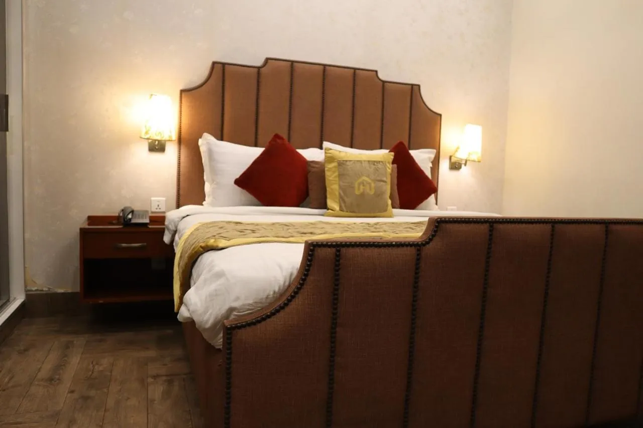 Bed in Hayyat Luxury Hotel Suites