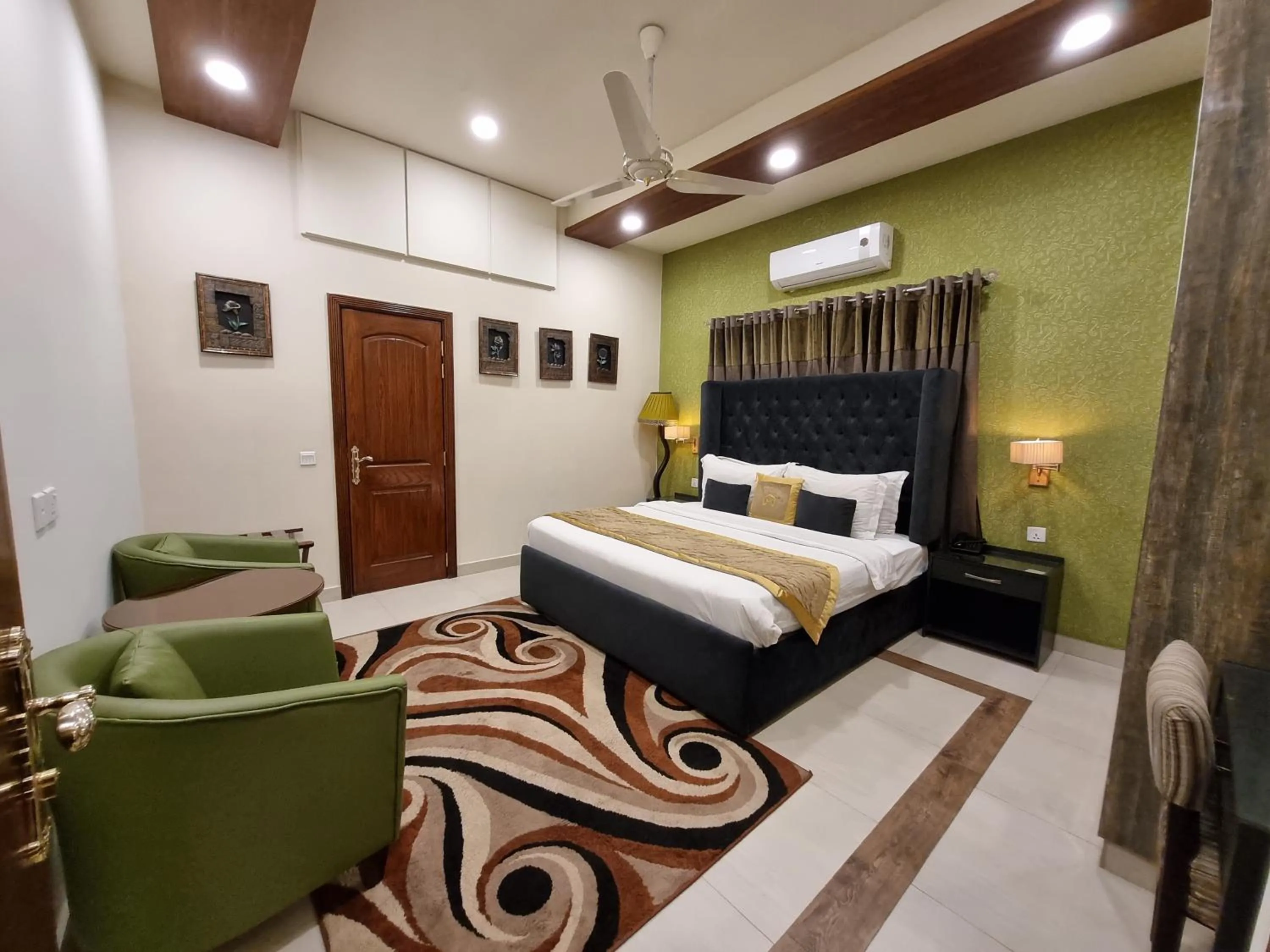 Bed in Hayyat Luxury Hotel Suites