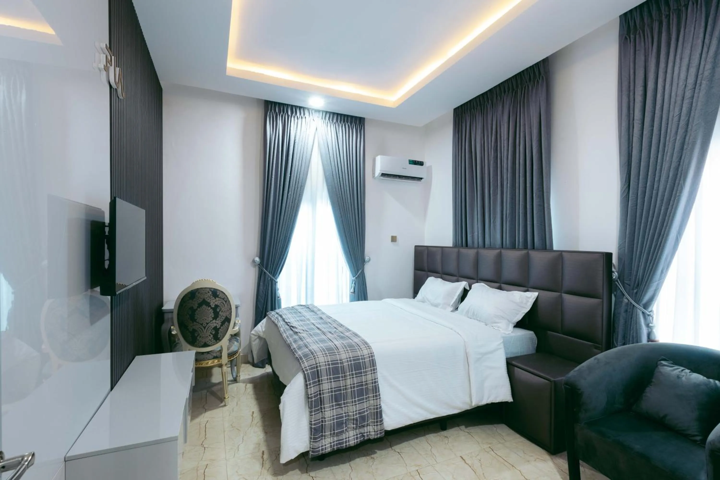 Bed in Phoenix Luxury Apartments