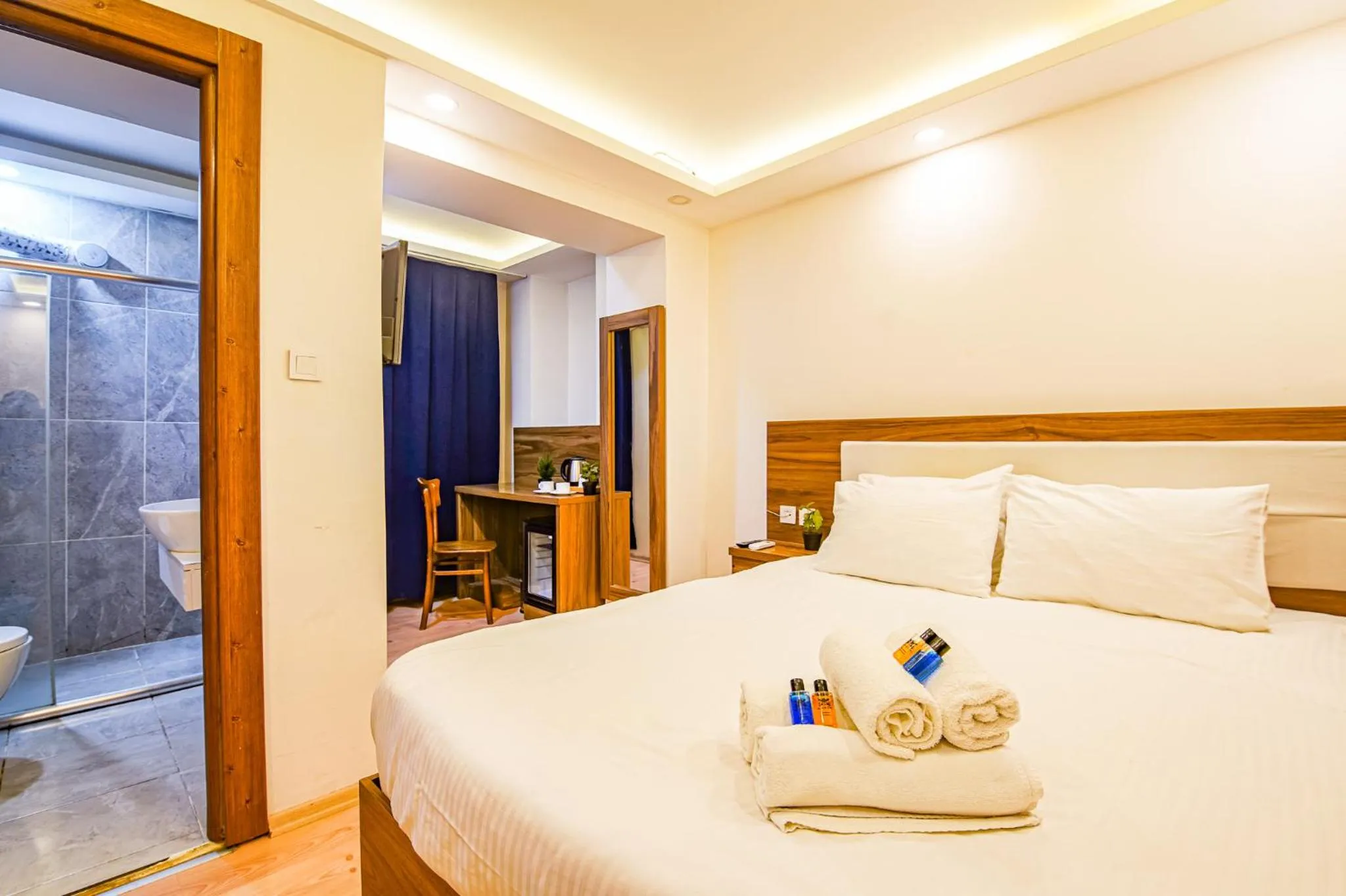 Bed in MITANI SUITES