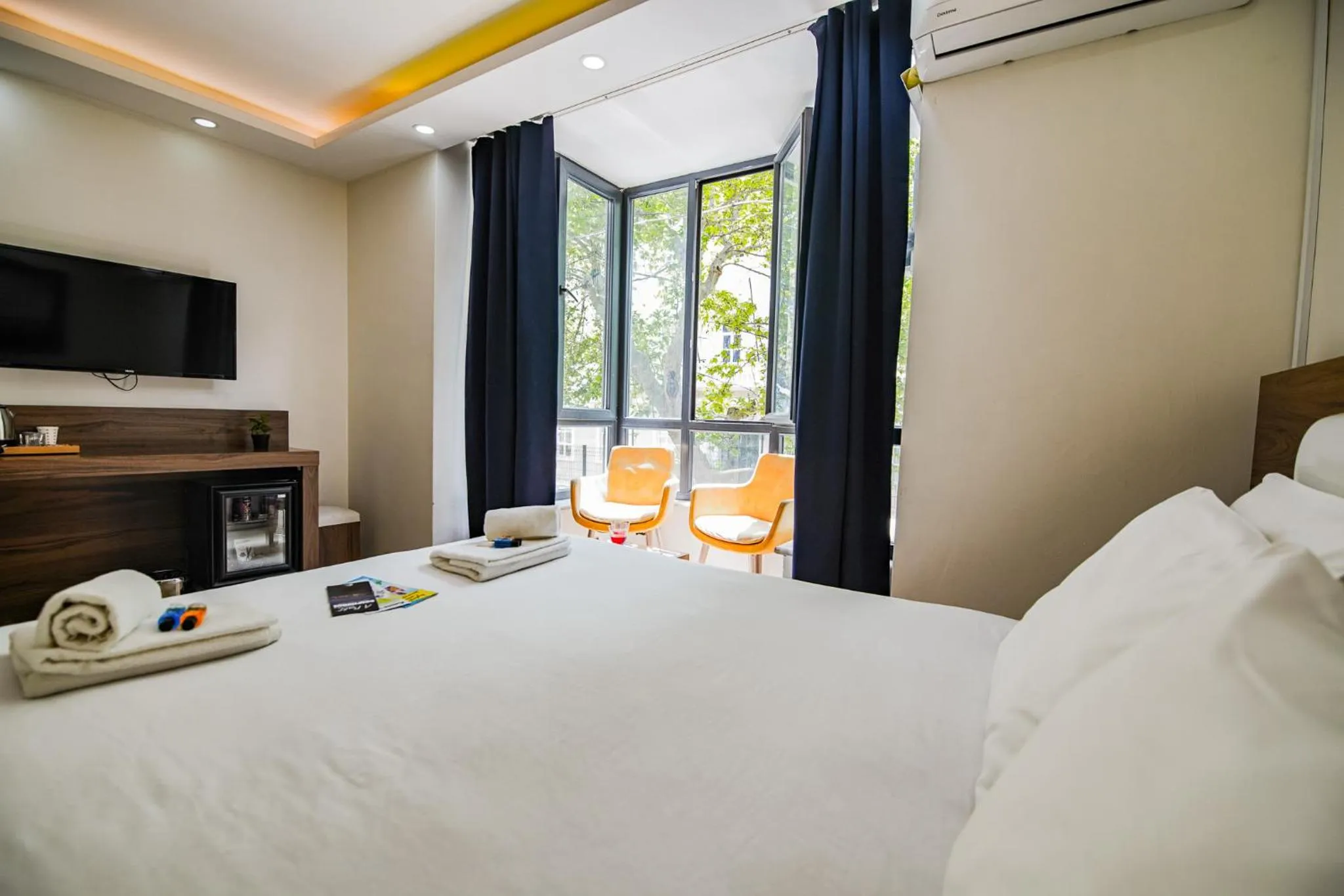 Bed in MITANI SUITES