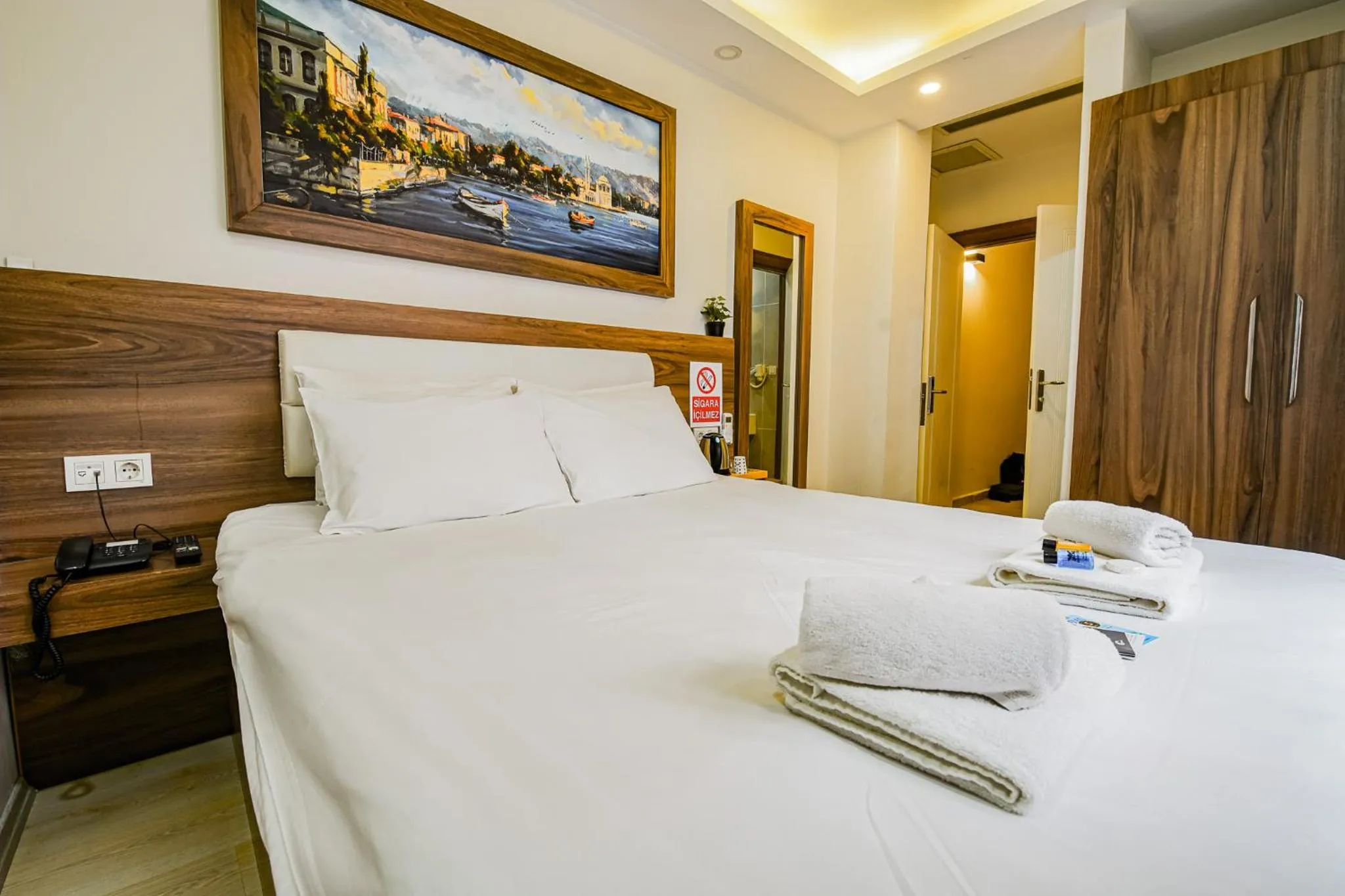 Bed in MITANI SUITES