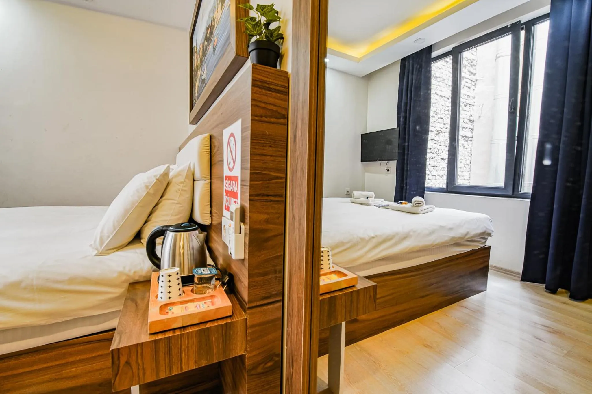 Bed in MITANI SUITES