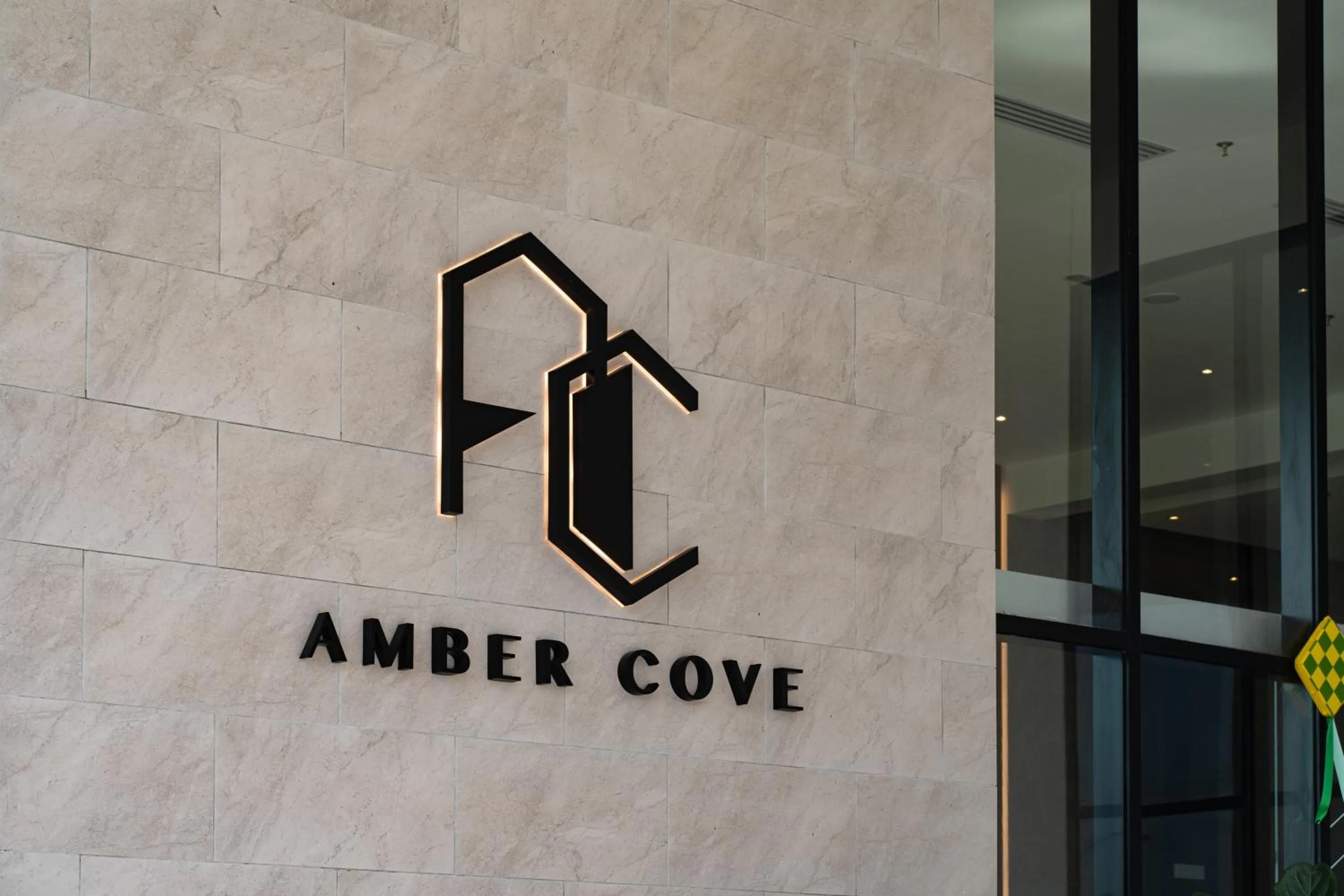 Property logo or sign in Amber Cove Impression City Melaka By Dawn Stay Free Netflix