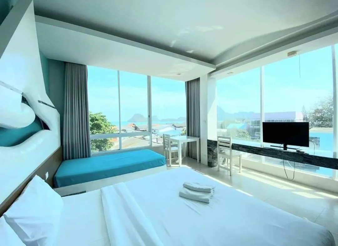 Bed in O-Bay Design Hotel Prachuap