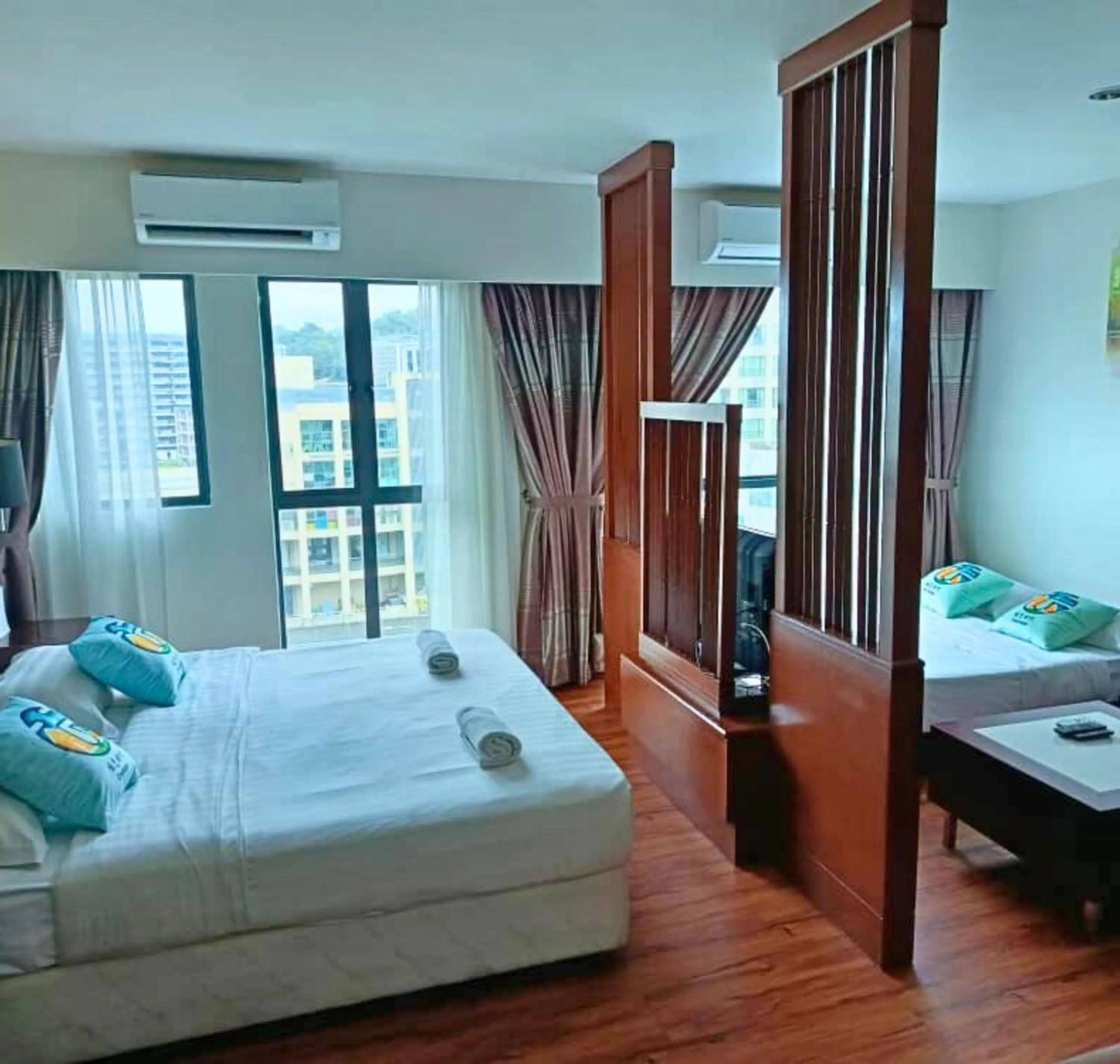 Bed in Greenage MingSuite 明绿时代套房 Kota Kinabalu 亚庇市中心
