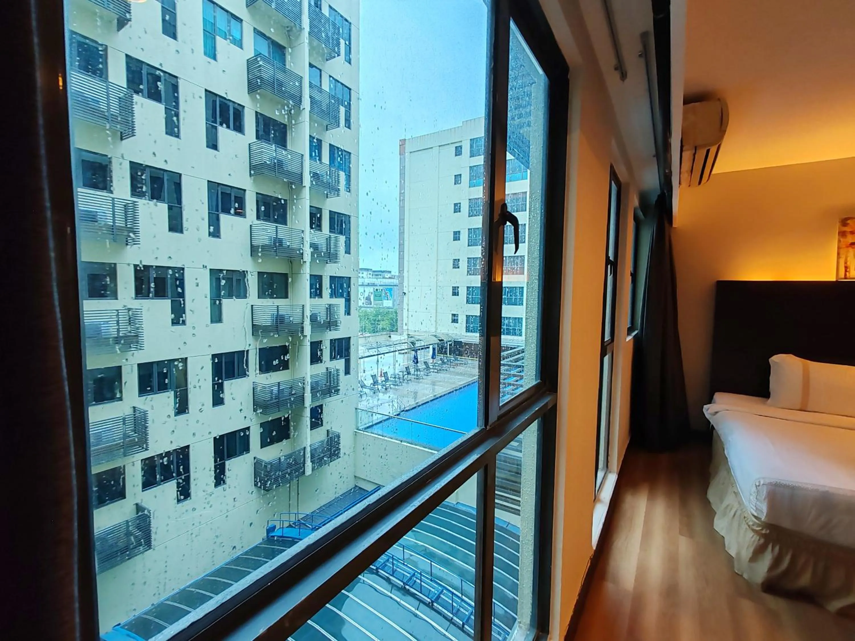 Bed in Greenage MingSuite 明绿时代套房 Kota Kinabalu 亚庇市中心