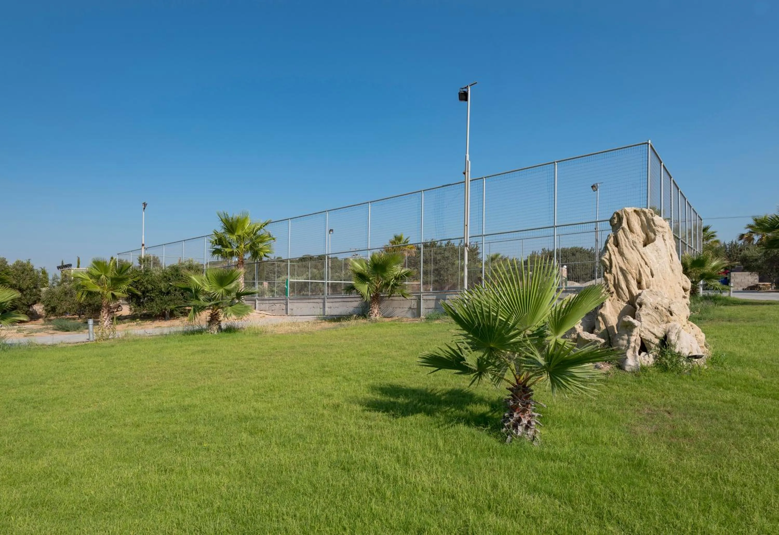 Tennis court in Achilleas Beach Hotel Adults Only