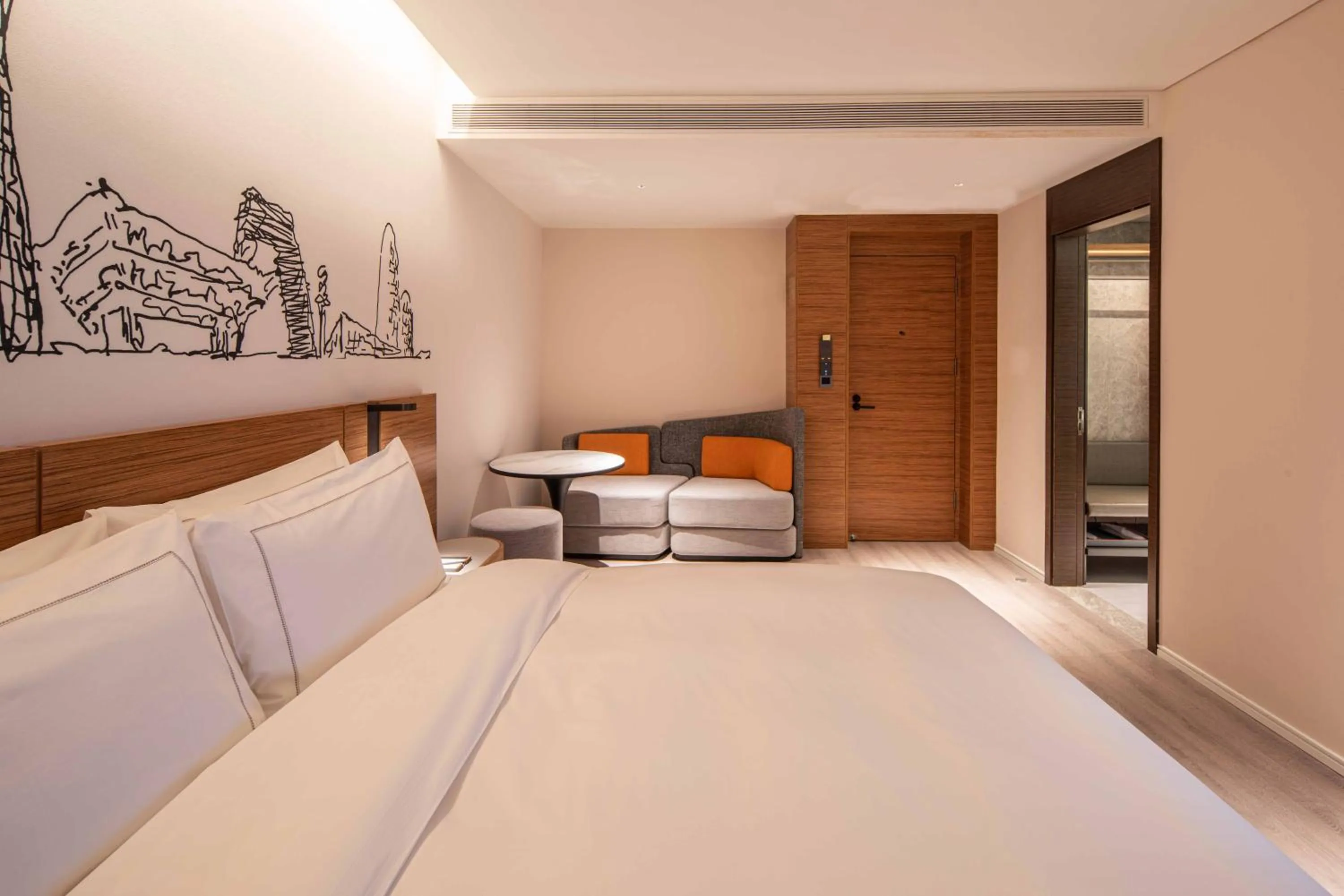 Seating area, Bed in UrCove by Hyatt Shanghai Lujiazui Expo Center