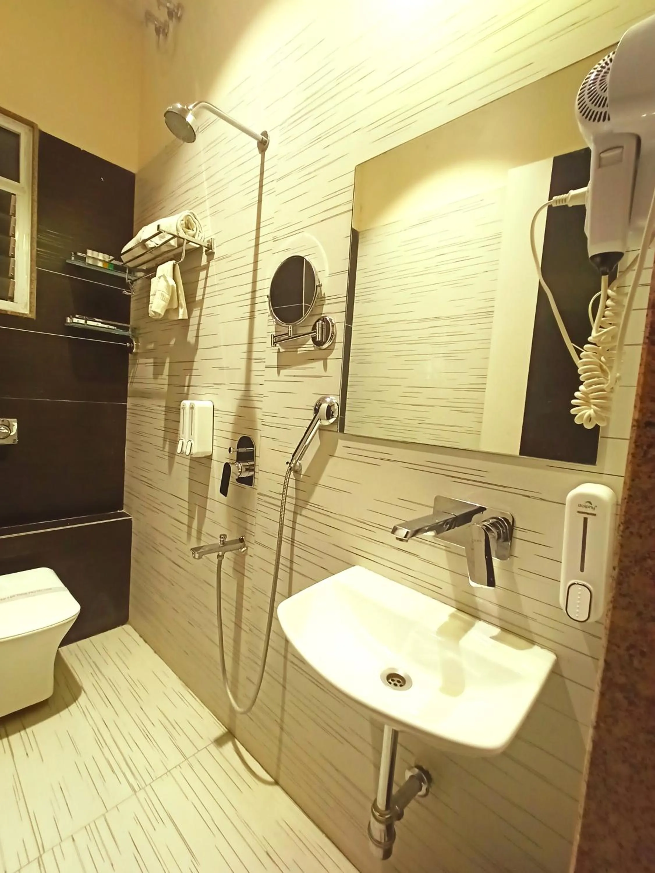 Shower in Radhamangal Colors Inn