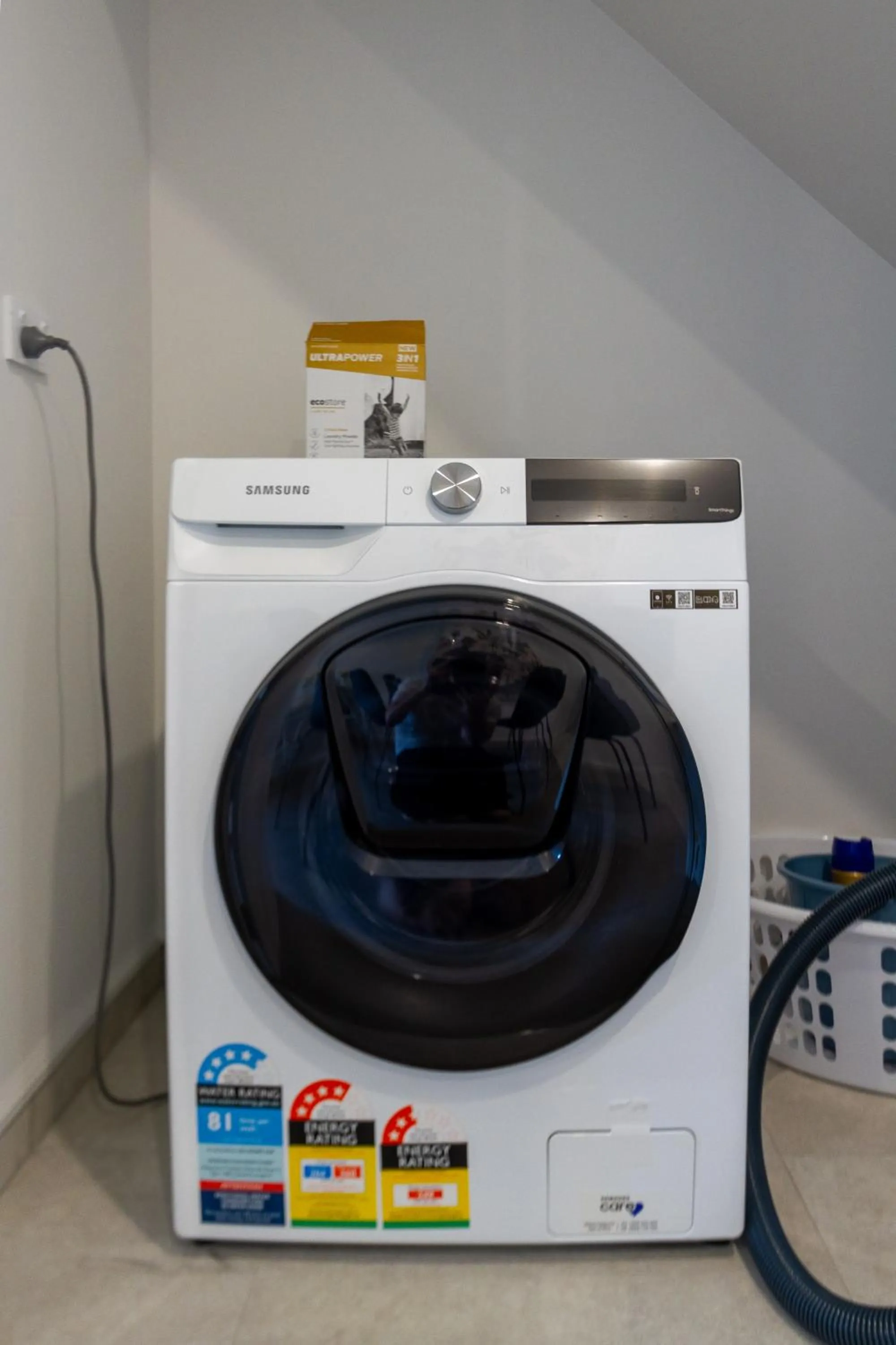 washing machine in City Lights Retreat with Carpark 2 Bed 2 Bath