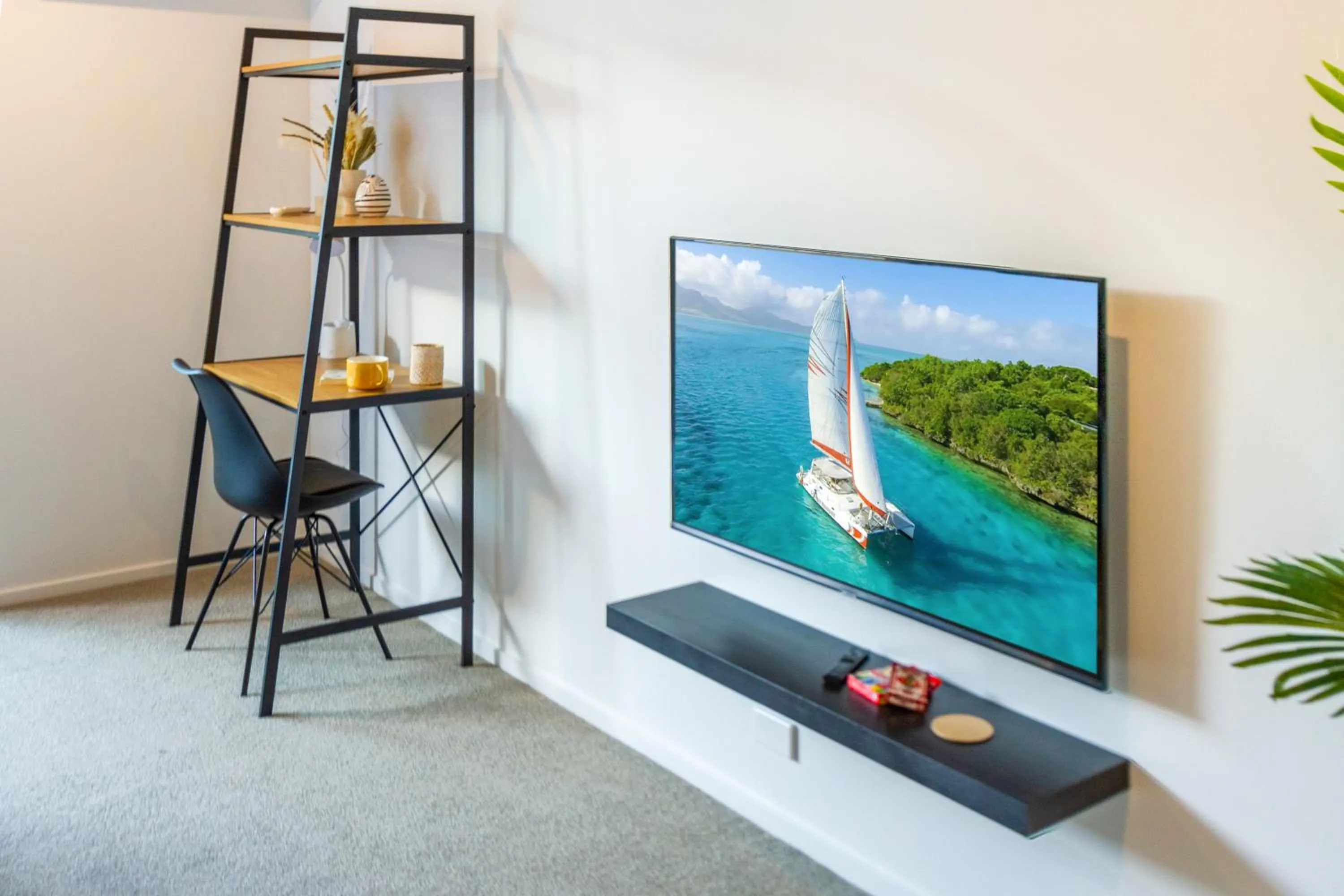 TV and multimedia in City Lights Retreat with Carpark 2 Bed 2 Bath