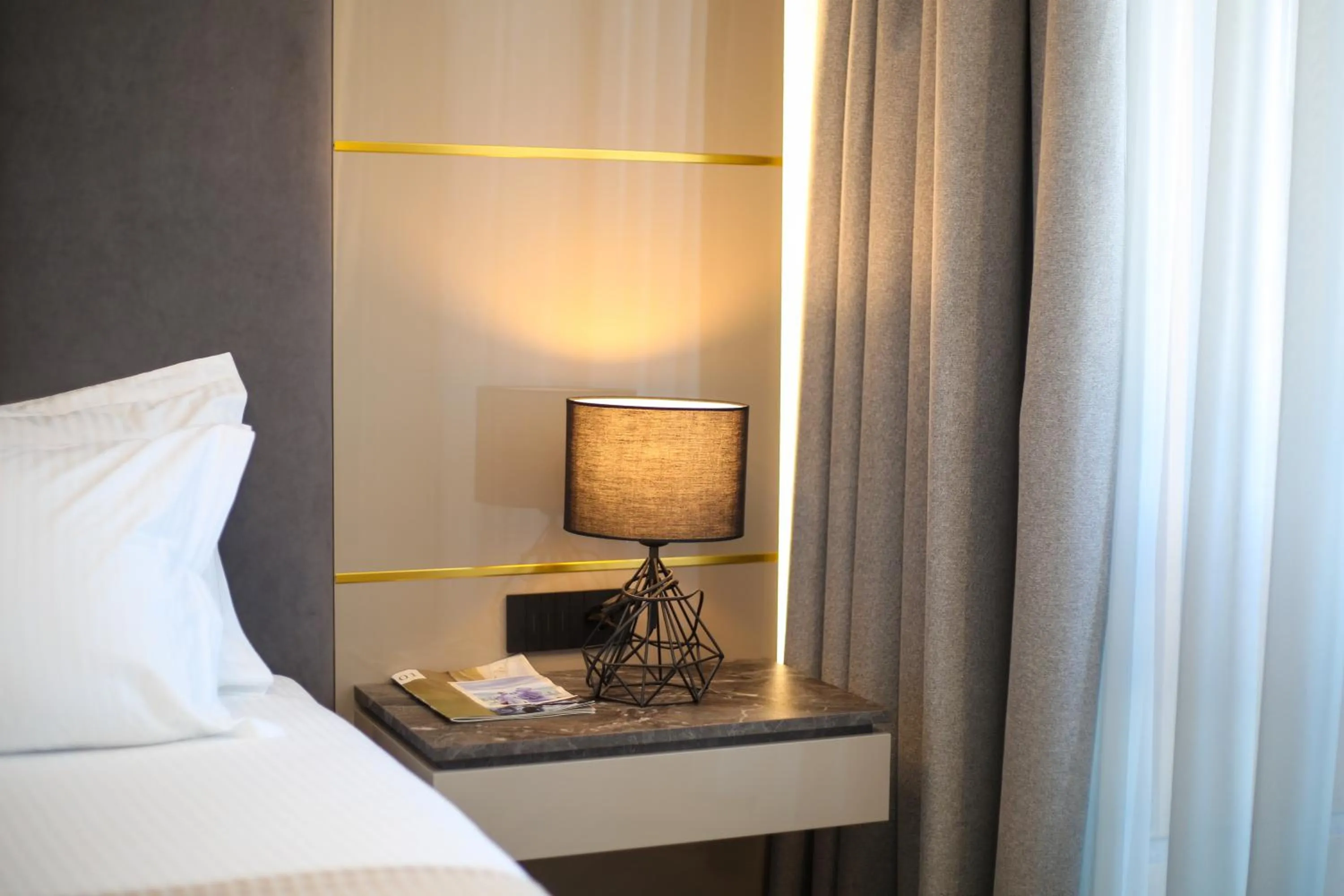 Bed in Belvedere Hotel & SPA