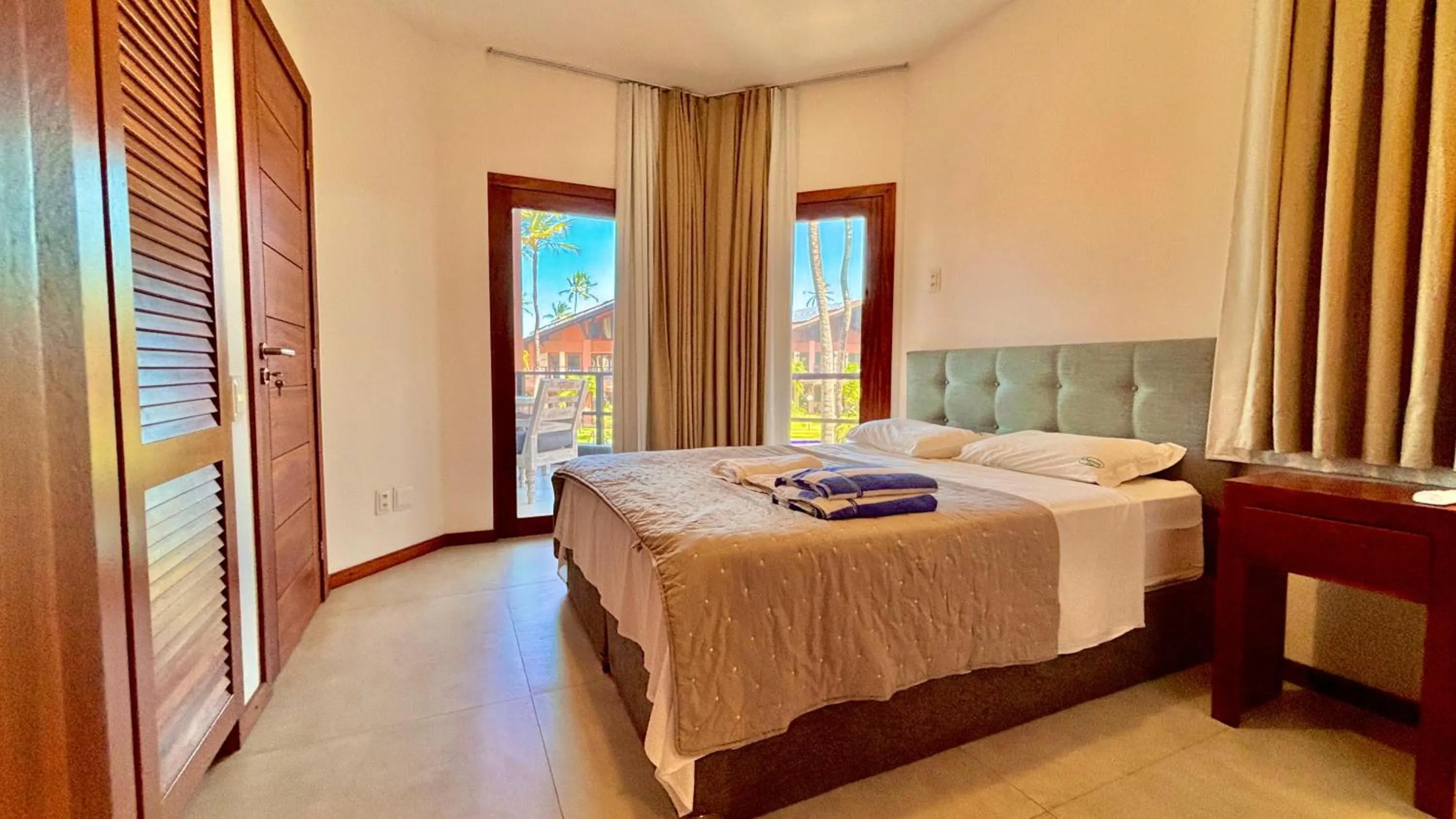 Bed in Dream Beach Cumbuco Superior Oceanfront Apartments