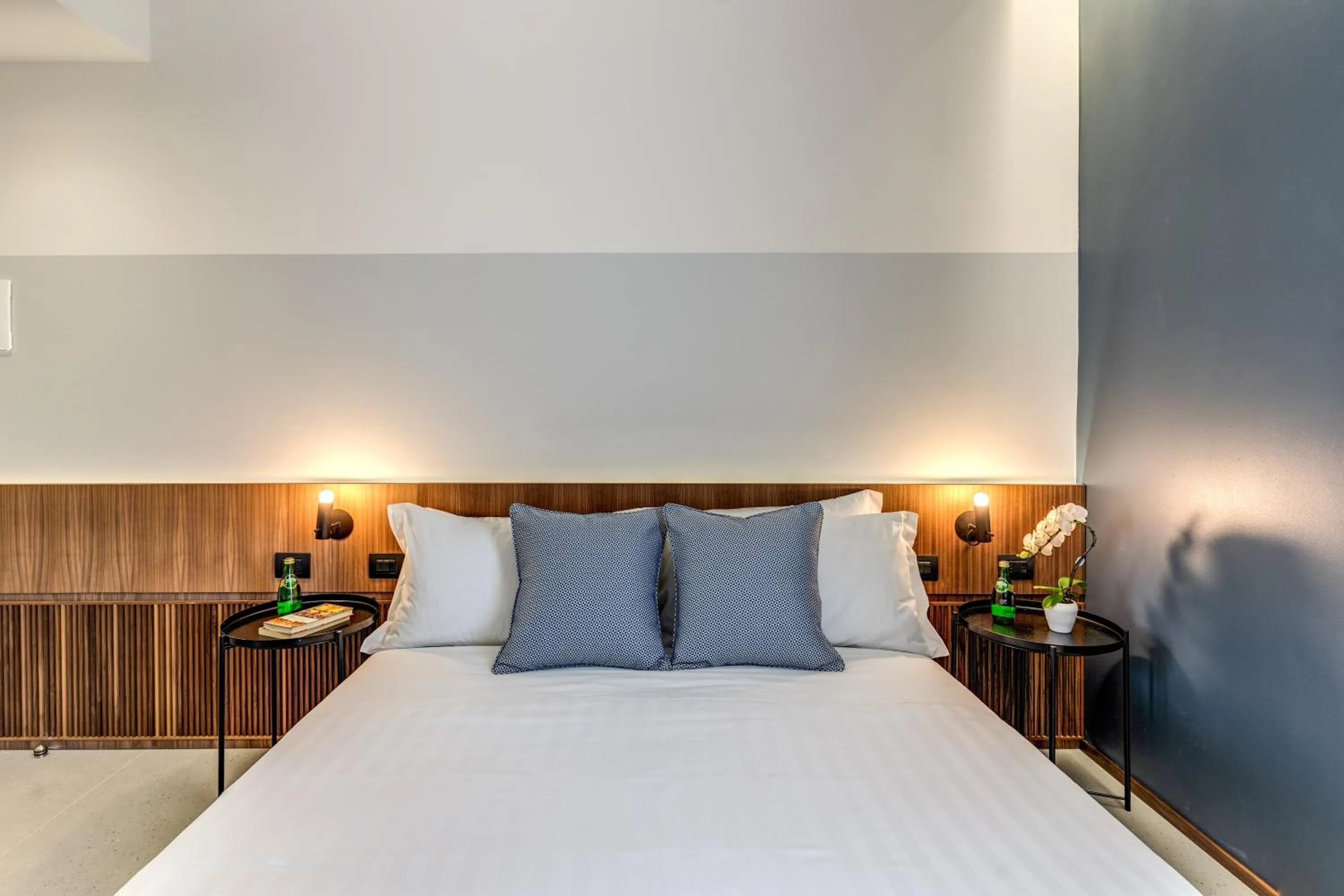 Bed in Sospeso Boutique Hotel