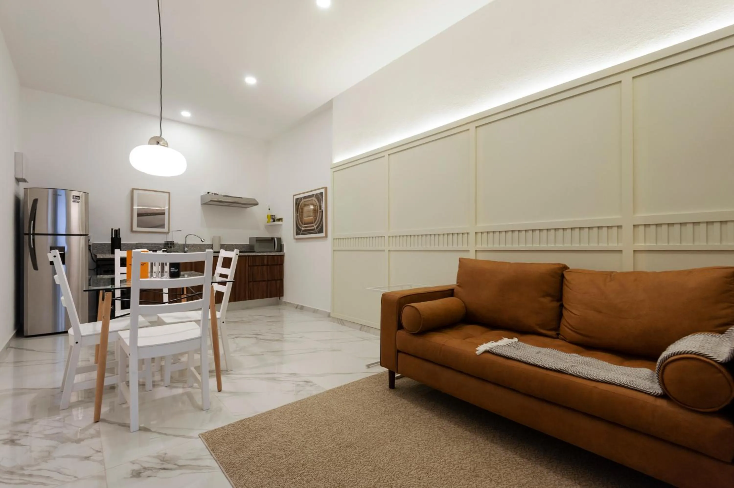 Living room in Allan Poe 343 by Wynwood House