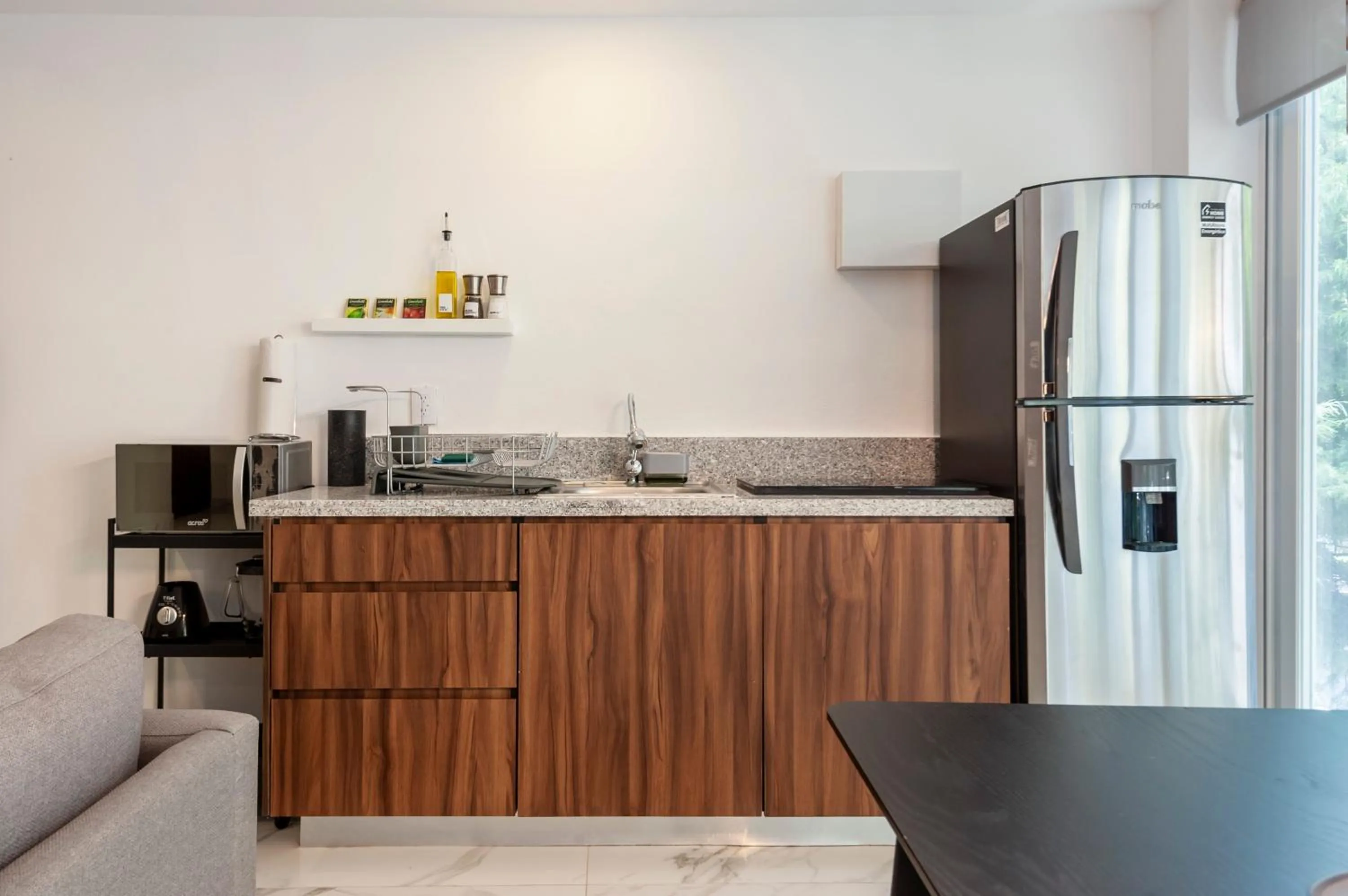 Kitchen or kitchenette in Allan Poe 343 by Wynwood House