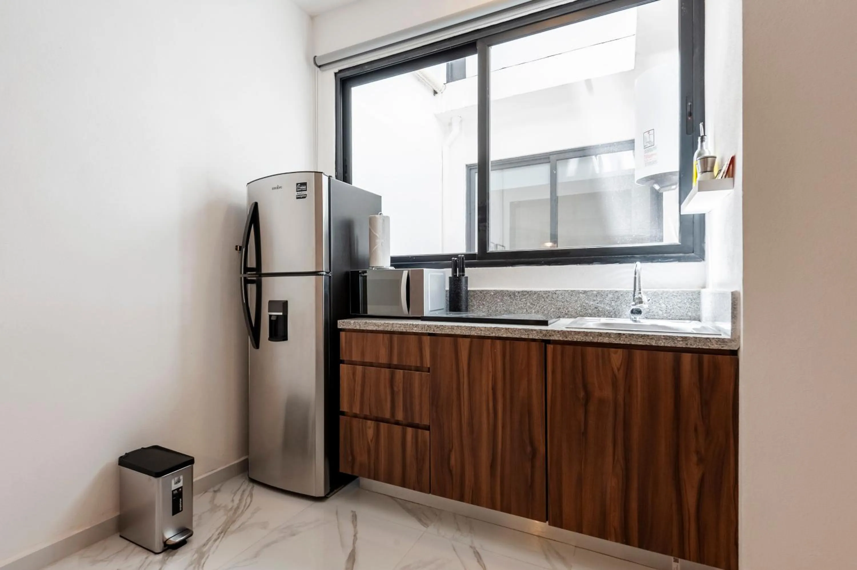 Kitchen or kitchenette in Allan Poe 343 by Wynwood House