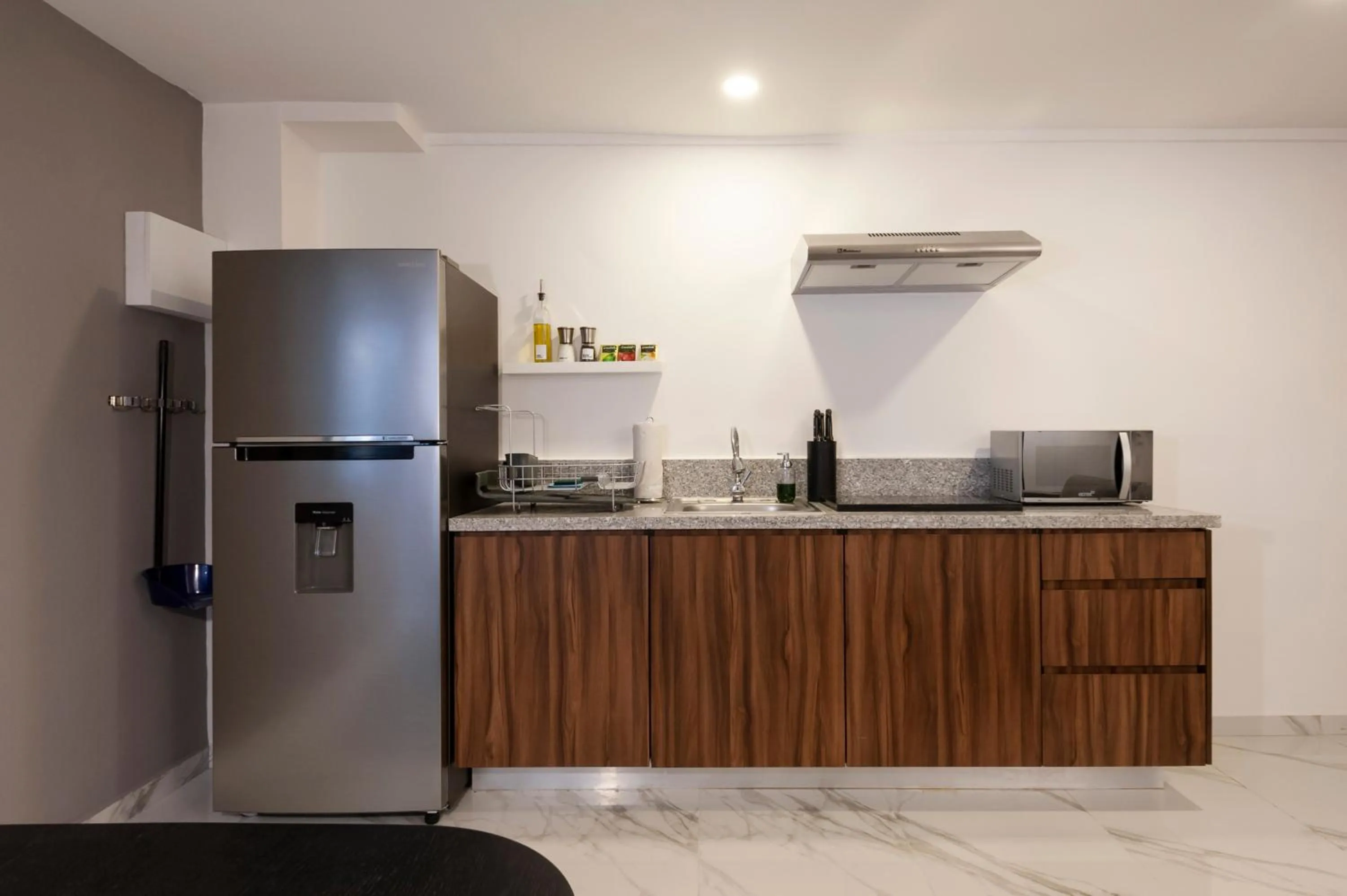 Kitchen or kitchenette in Allan Poe 343 by Wynwood House