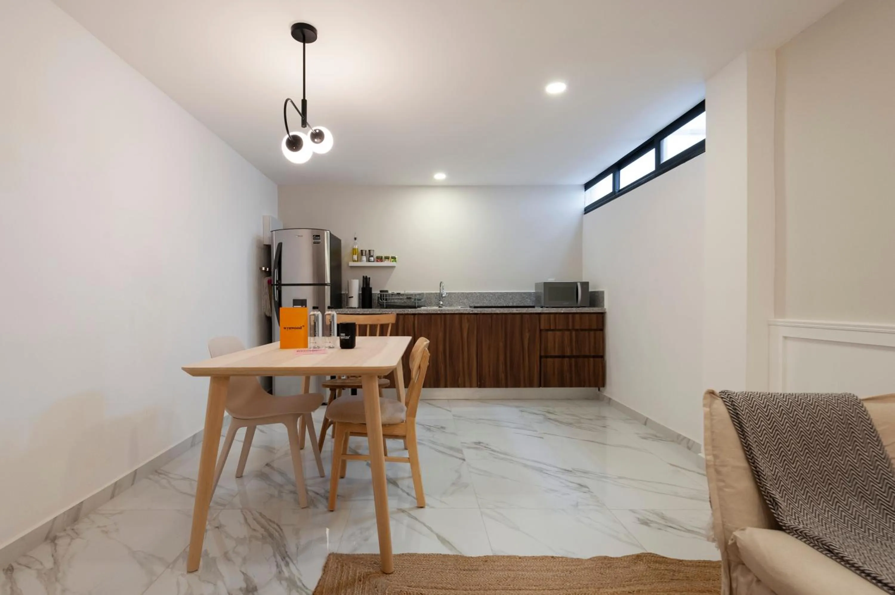 Kitchen or kitchenette in Allan Poe 343 by Wynwood House