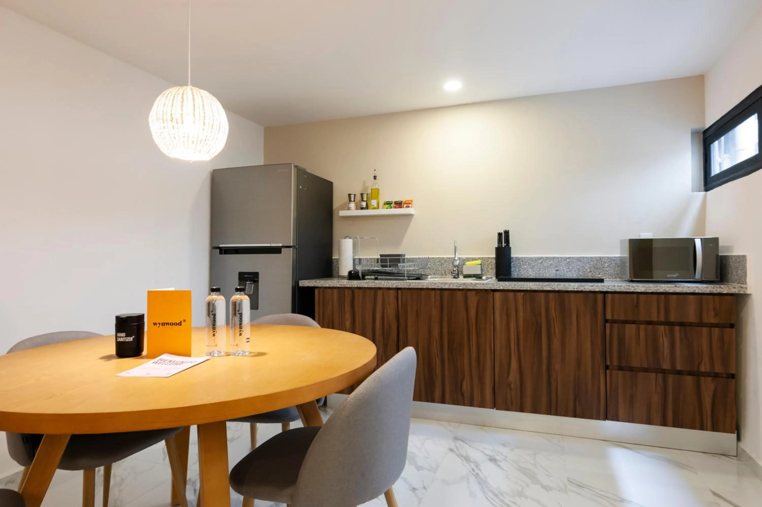 Dining area in Allan Poe 343 by Wynwood House