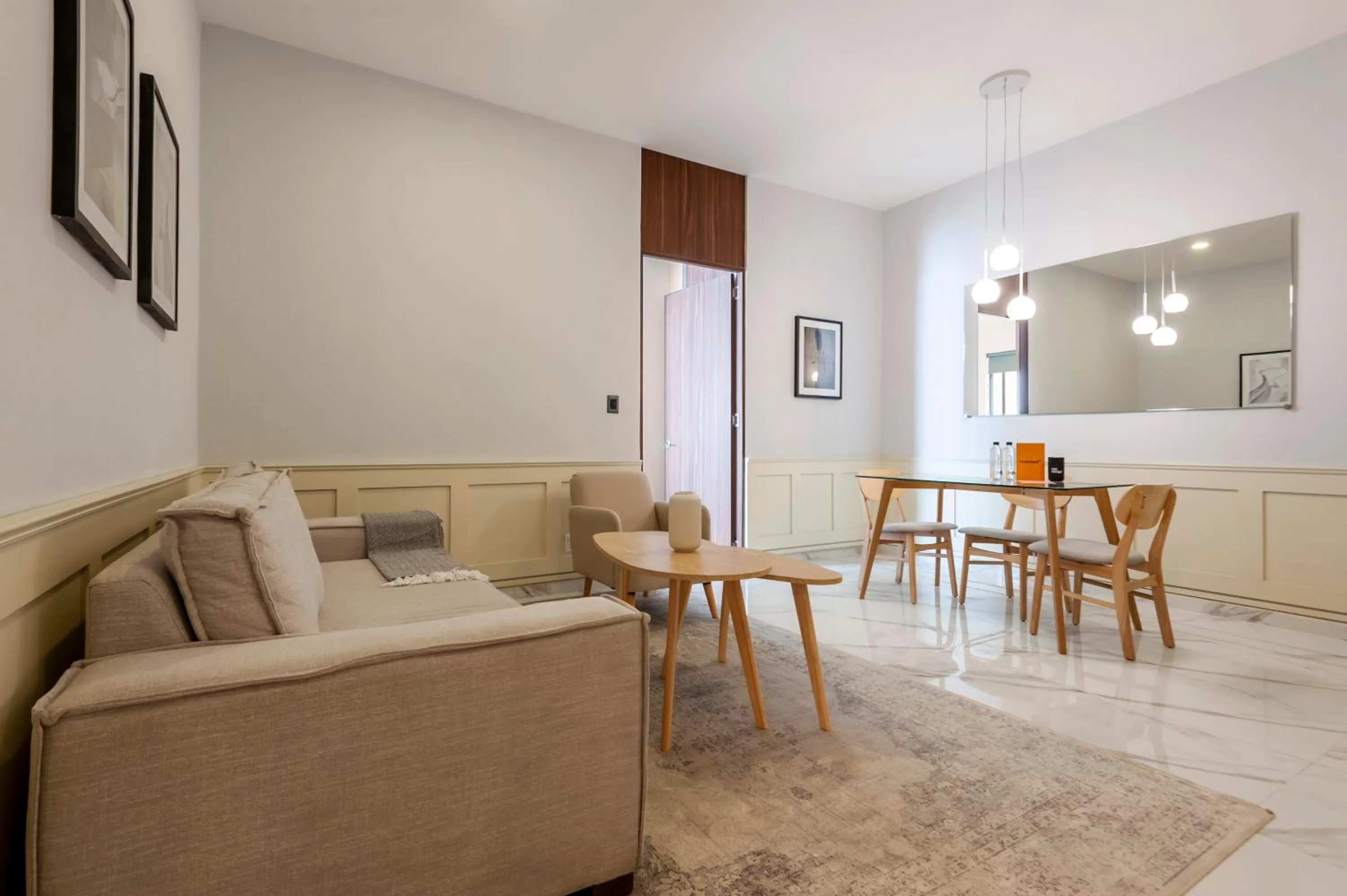 Living room in Allan Poe 343 by Wynwood House