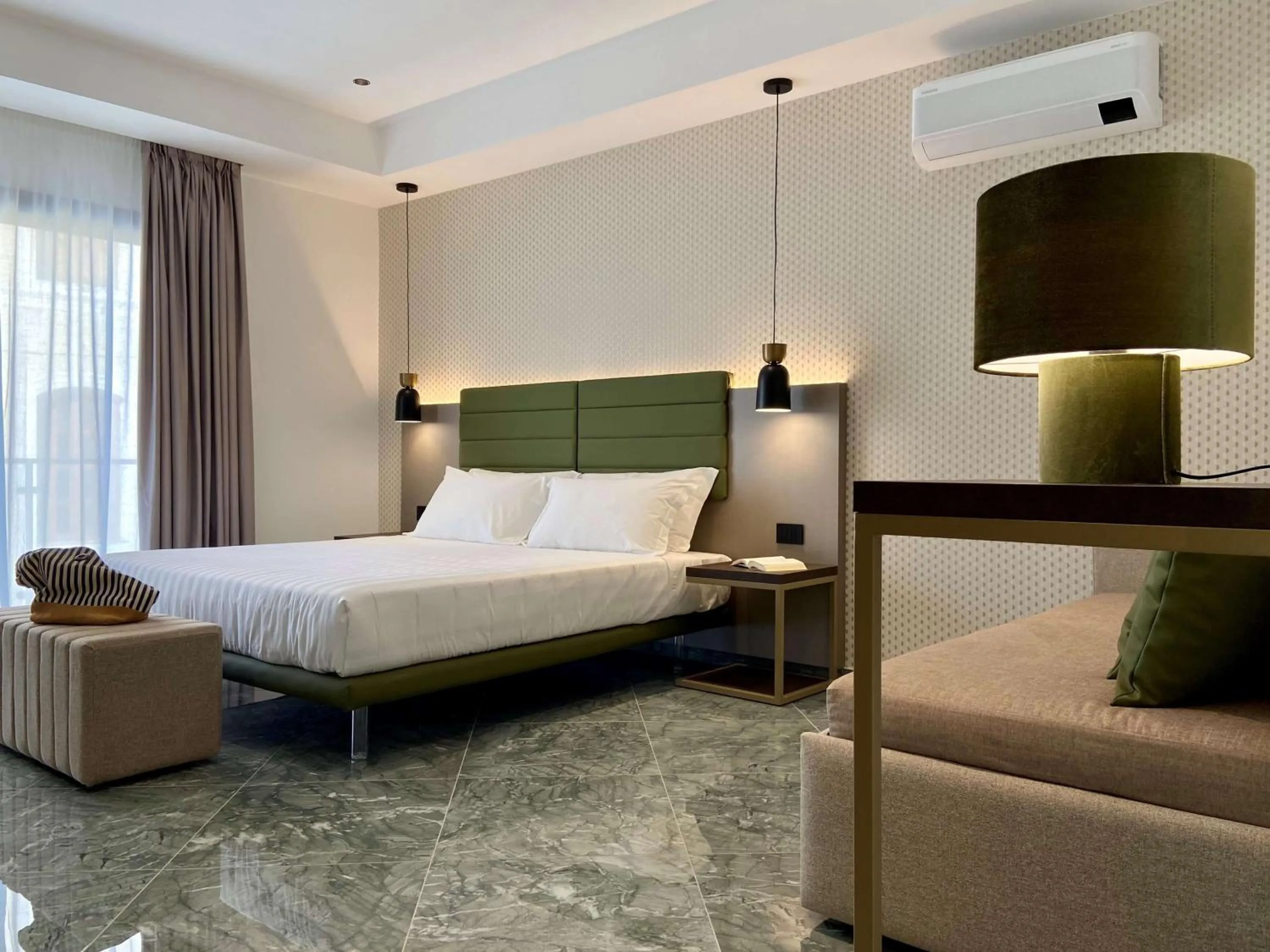 Bed in Salemare Rooms & Suites