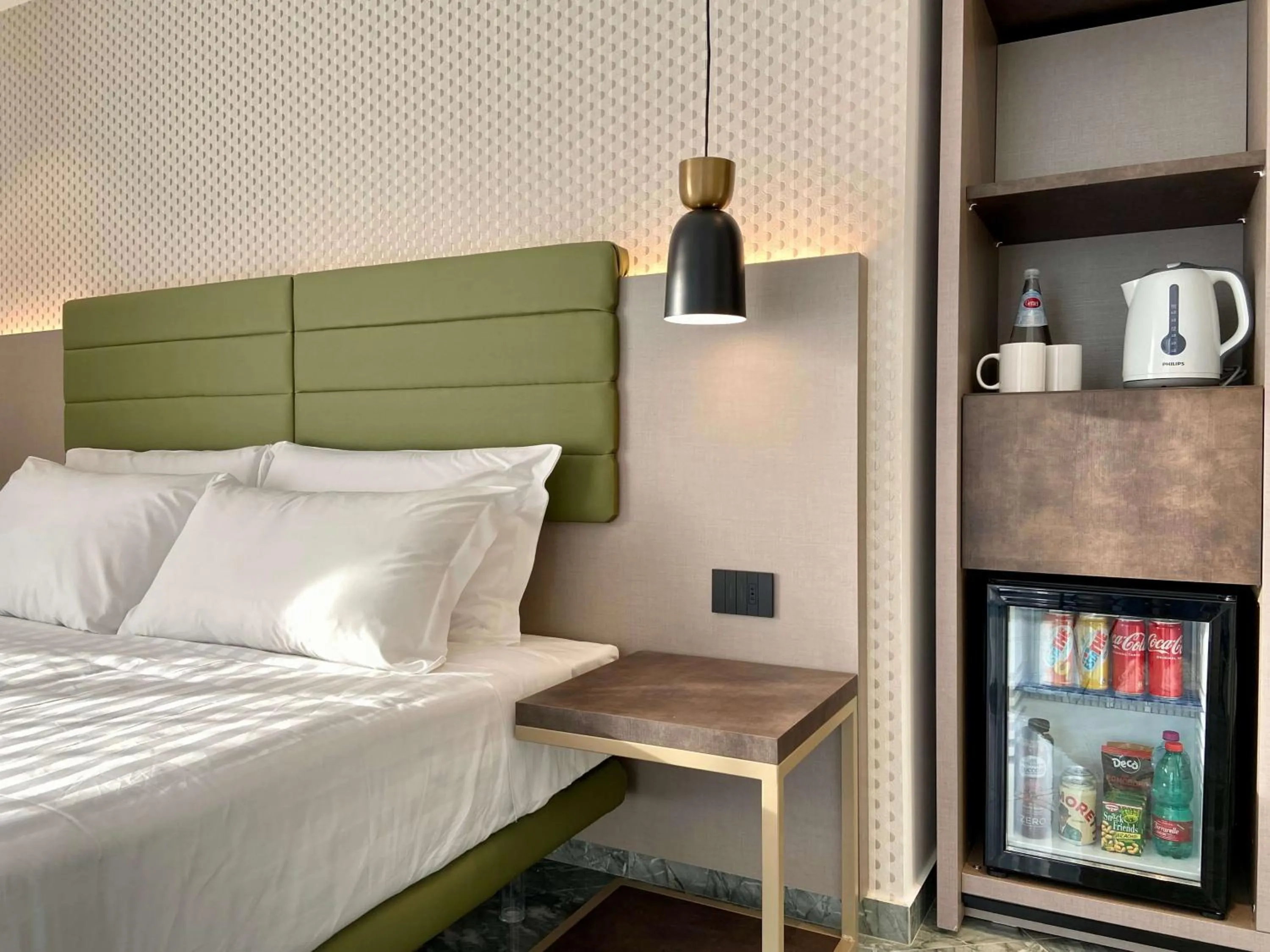 Bed in Salemare Rooms & Suites