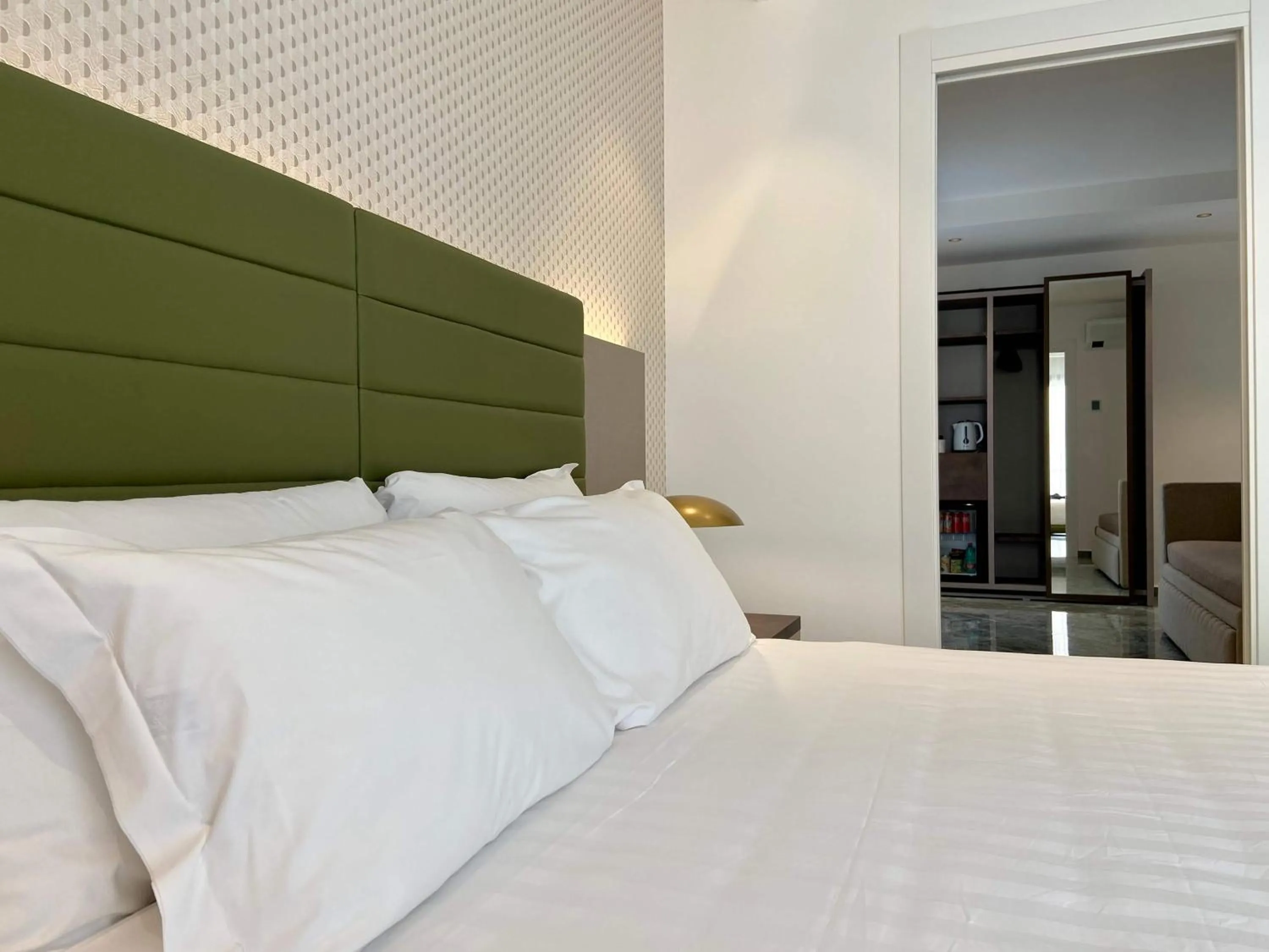 Bed in Salemare Rooms & Suites