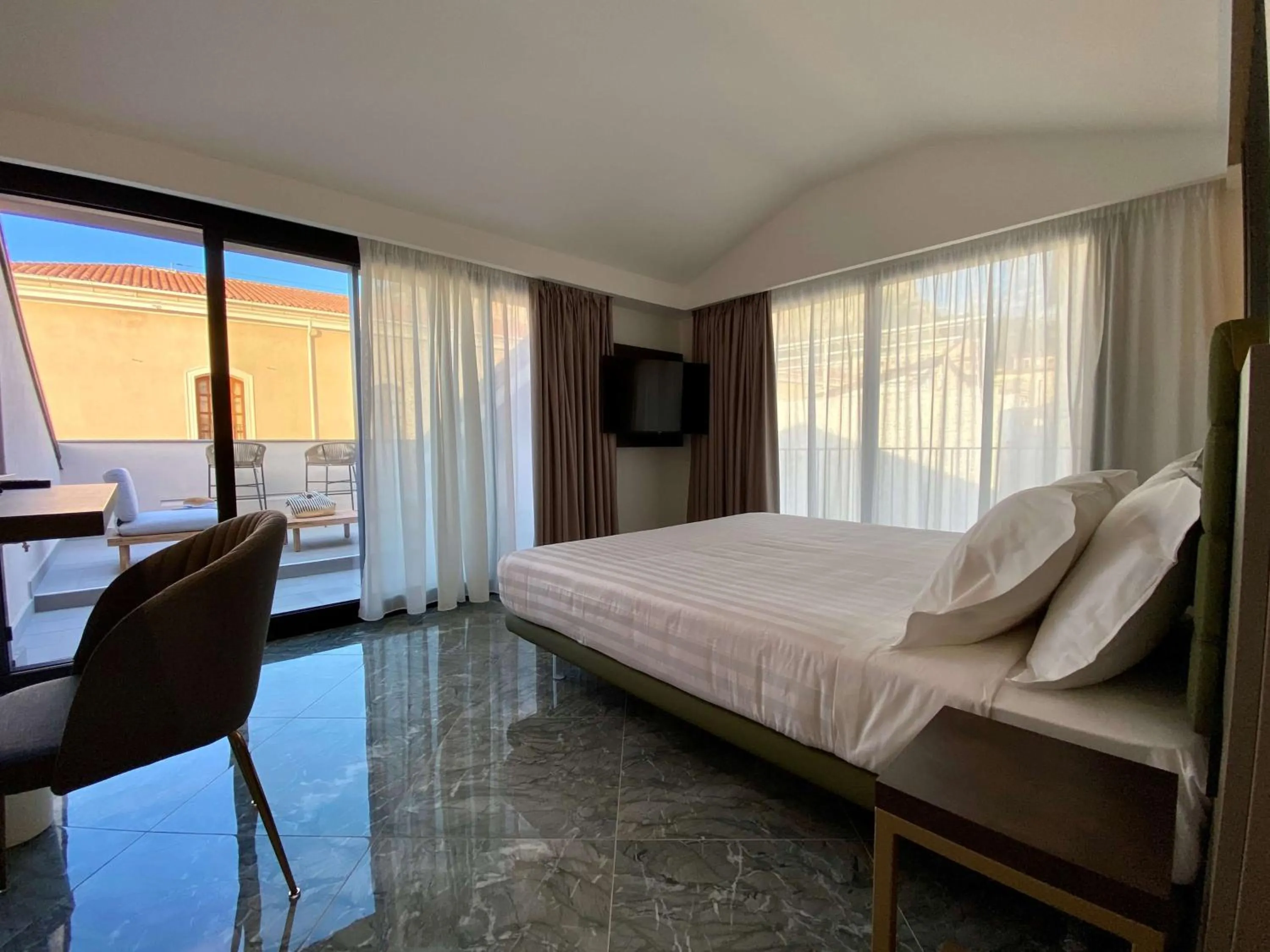 Bed in Salemare Rooms & Suites