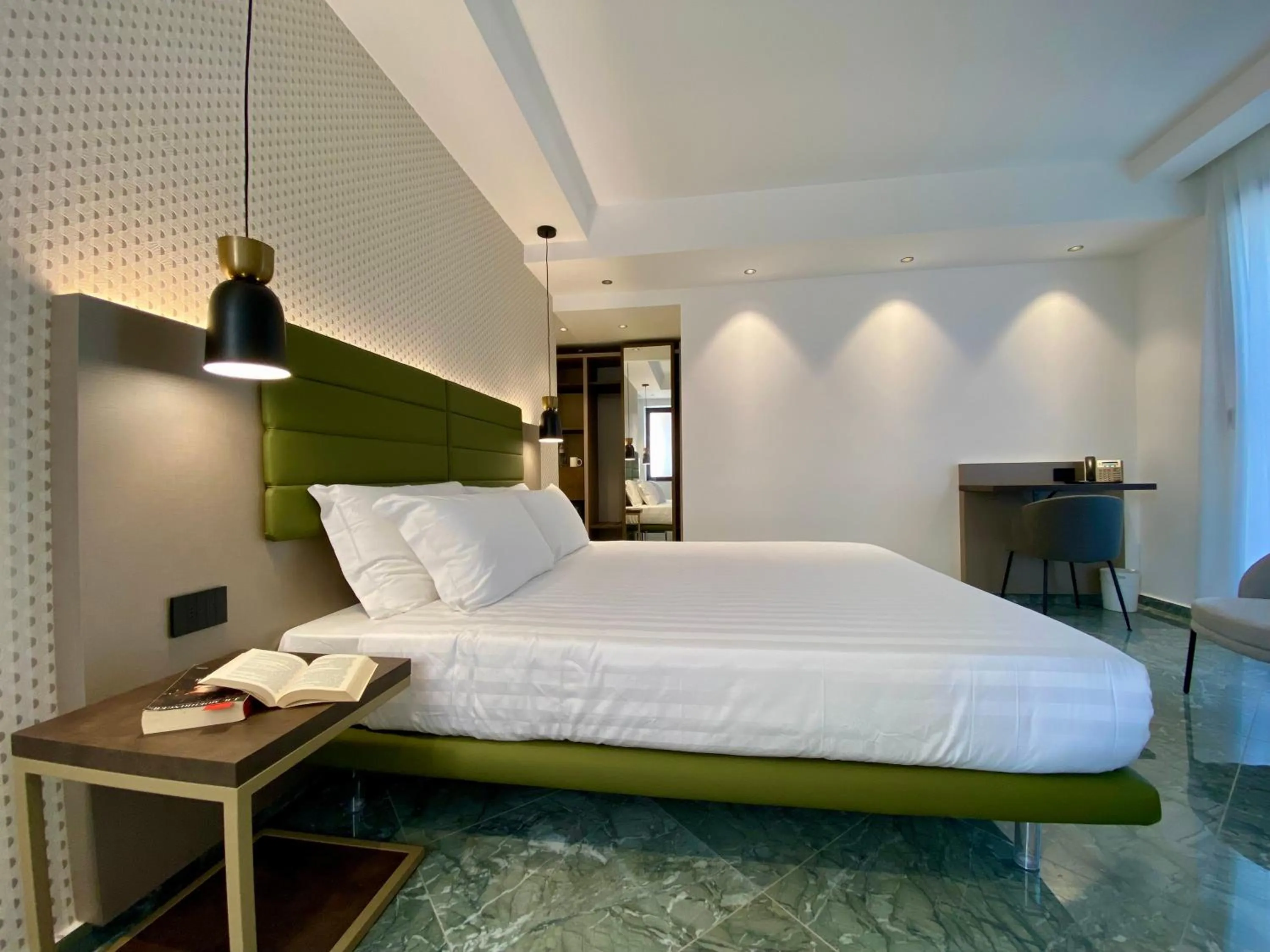 Bed in Salemare Rooms & Suites
