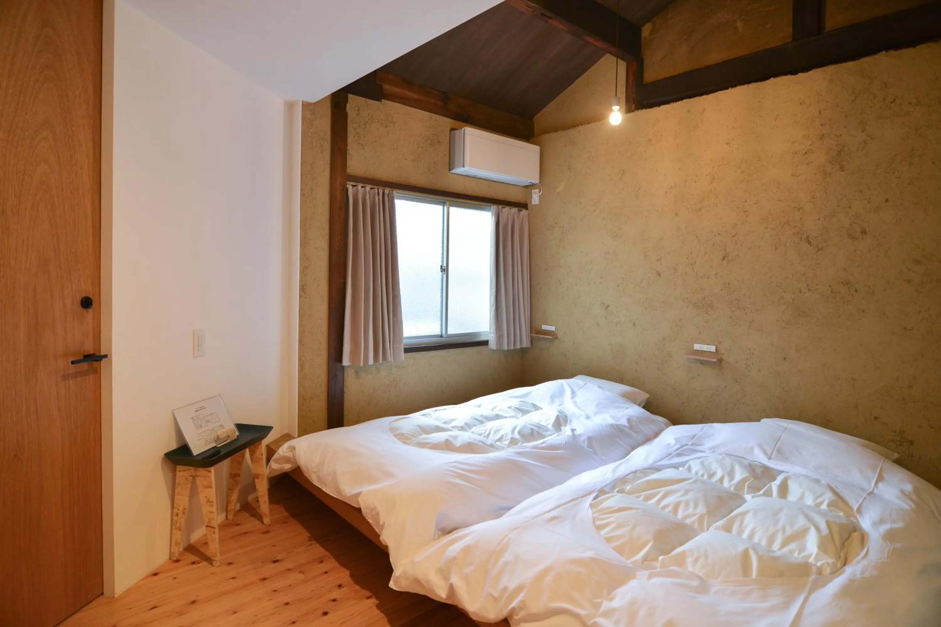Bed in Bokuyado Nishijin