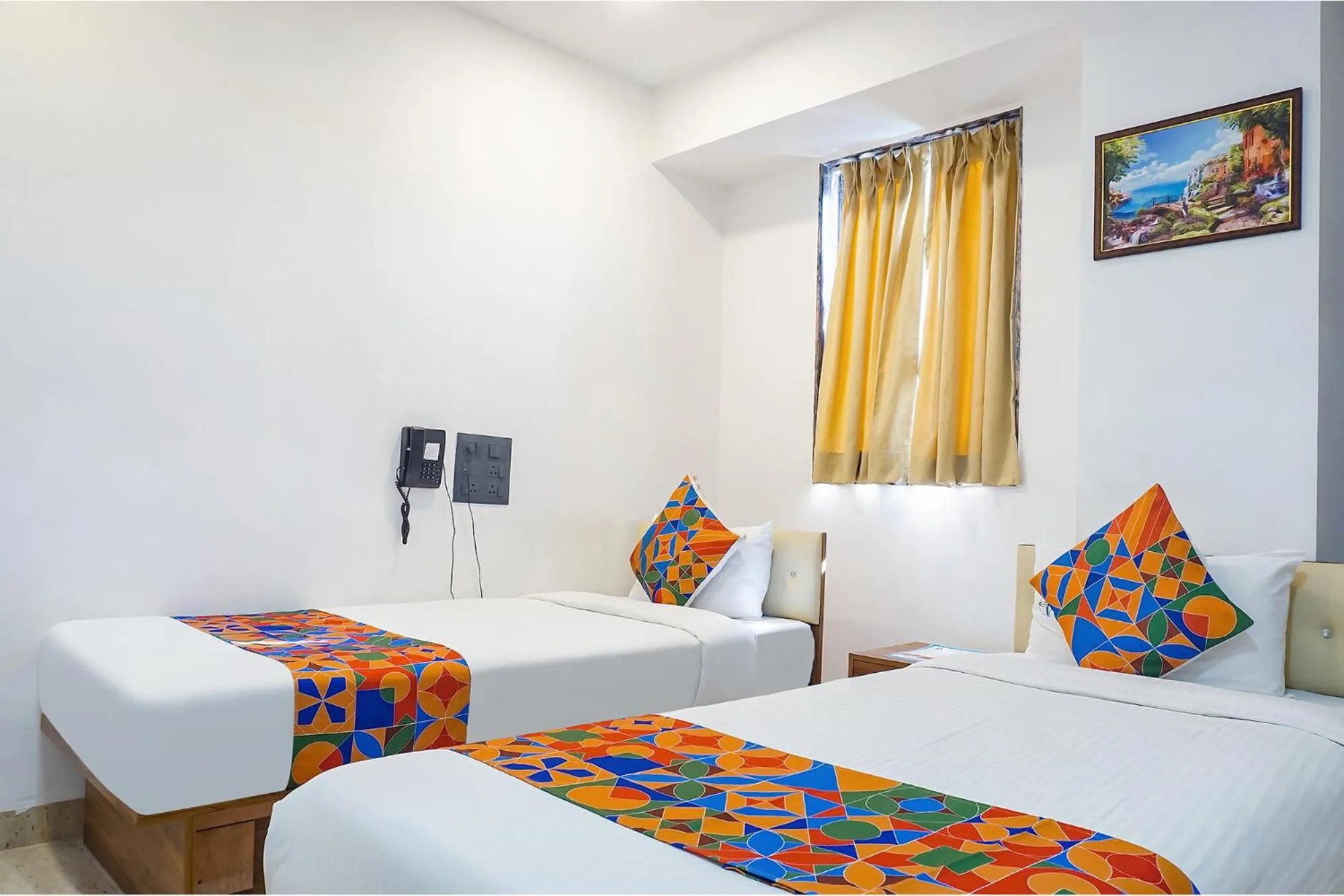 Bed in FabHotel Atithi Regency