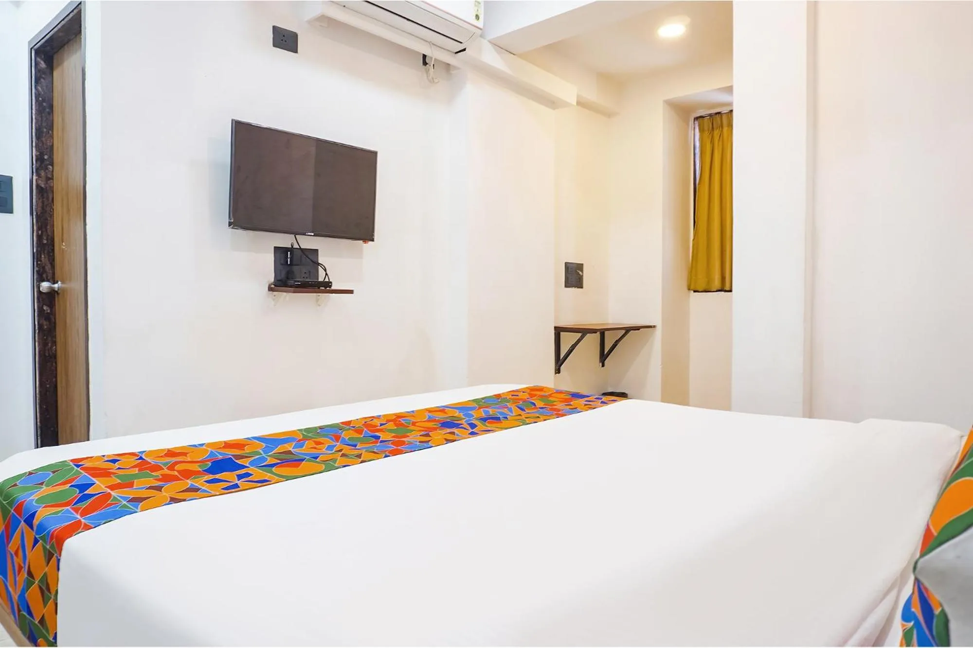 Bed in FabHotel Atithi Regency
