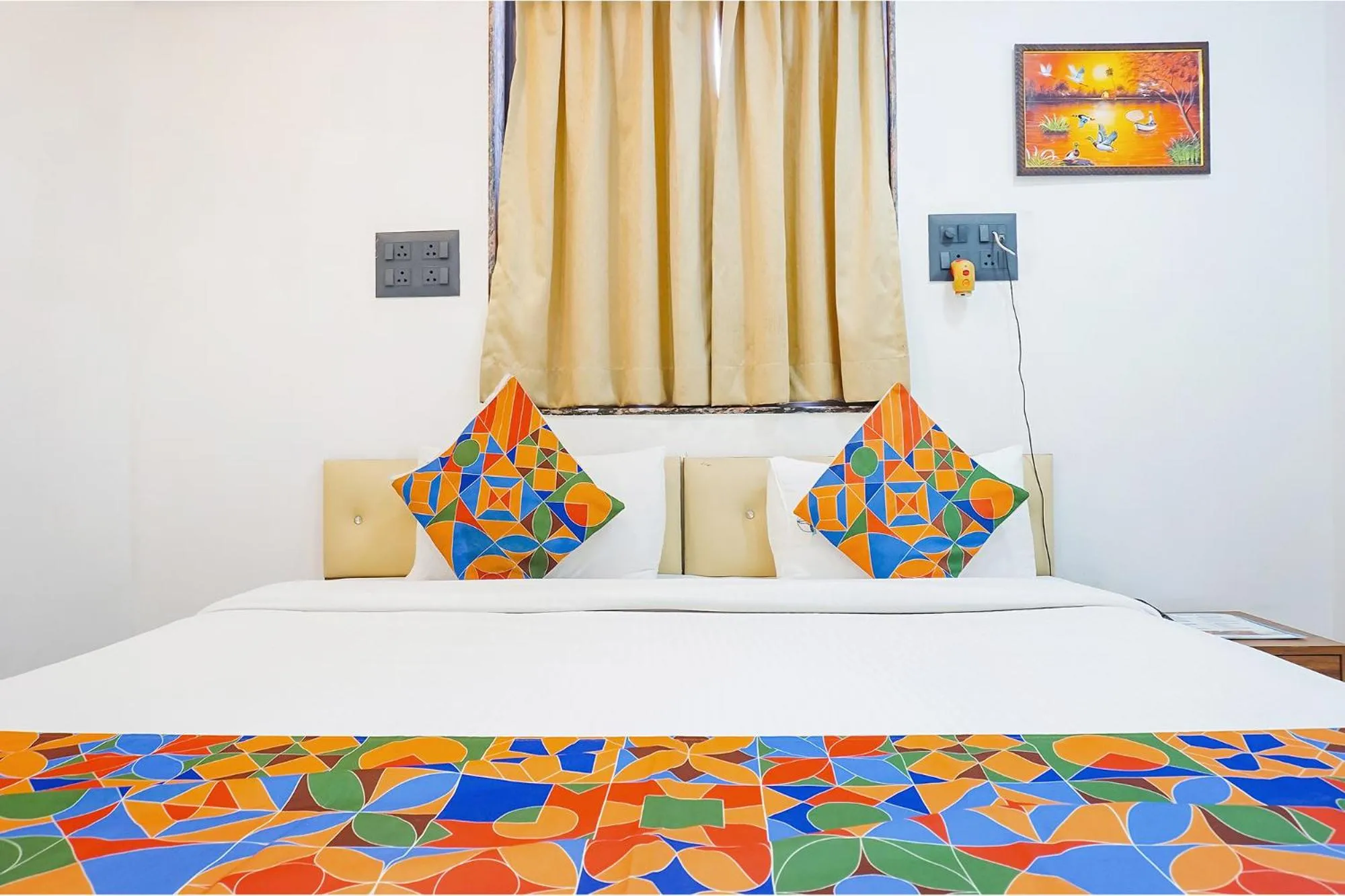 Bed in FabHotel Atithi Regency