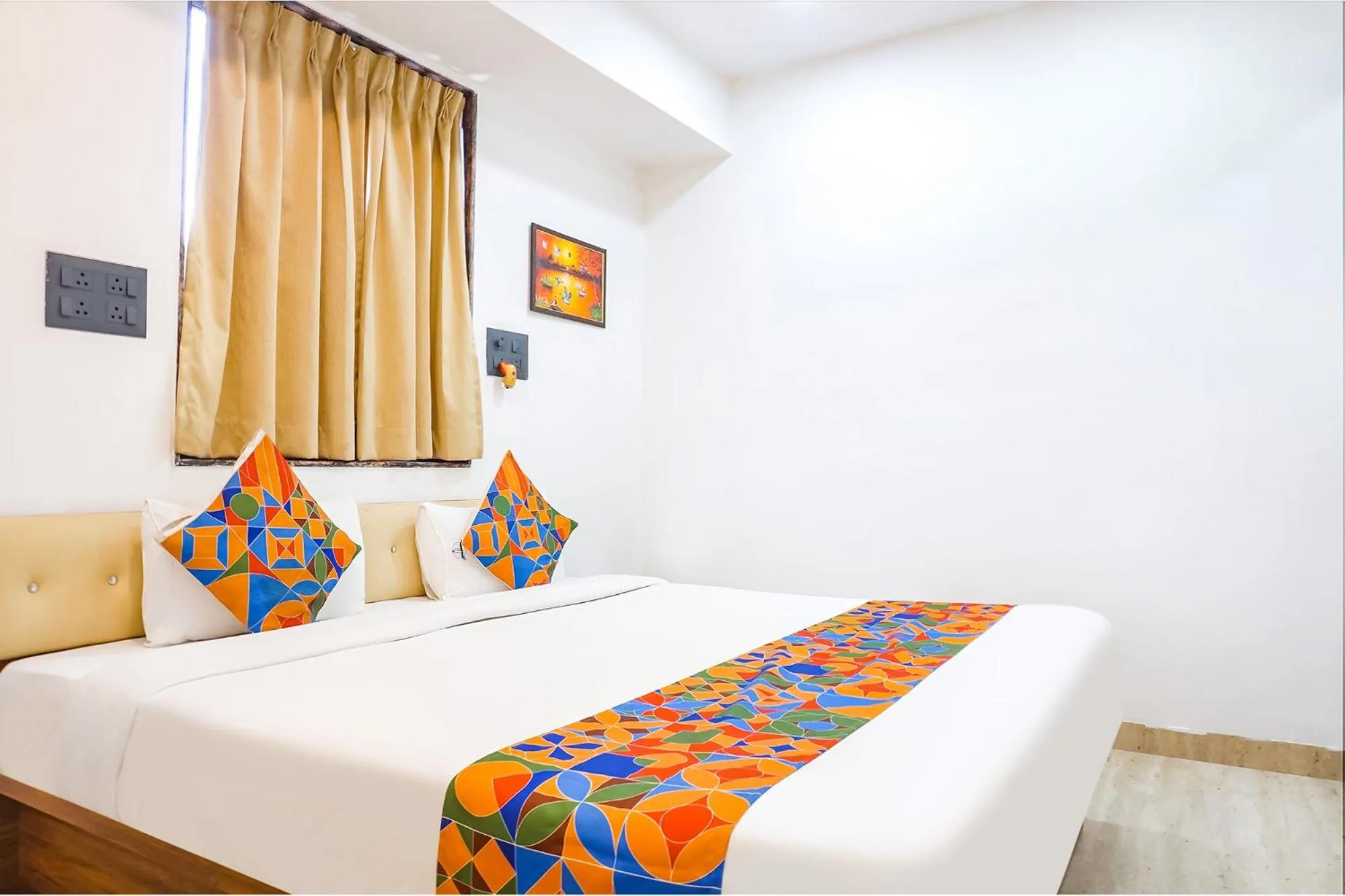 Bed in FabHotel Atithi Regency