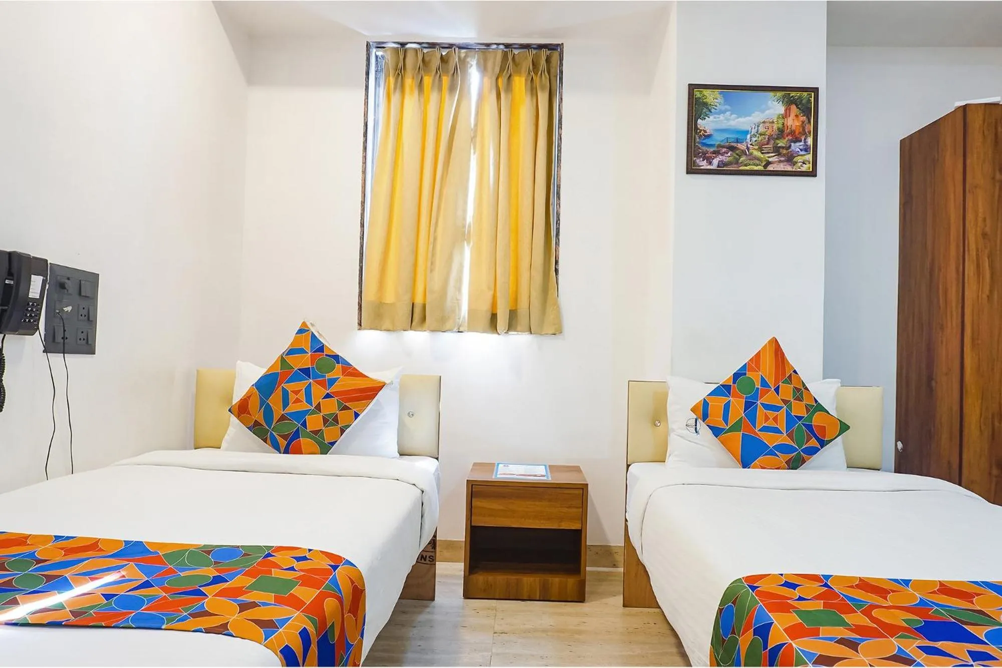 Bed in FabHotel Atithi Regency