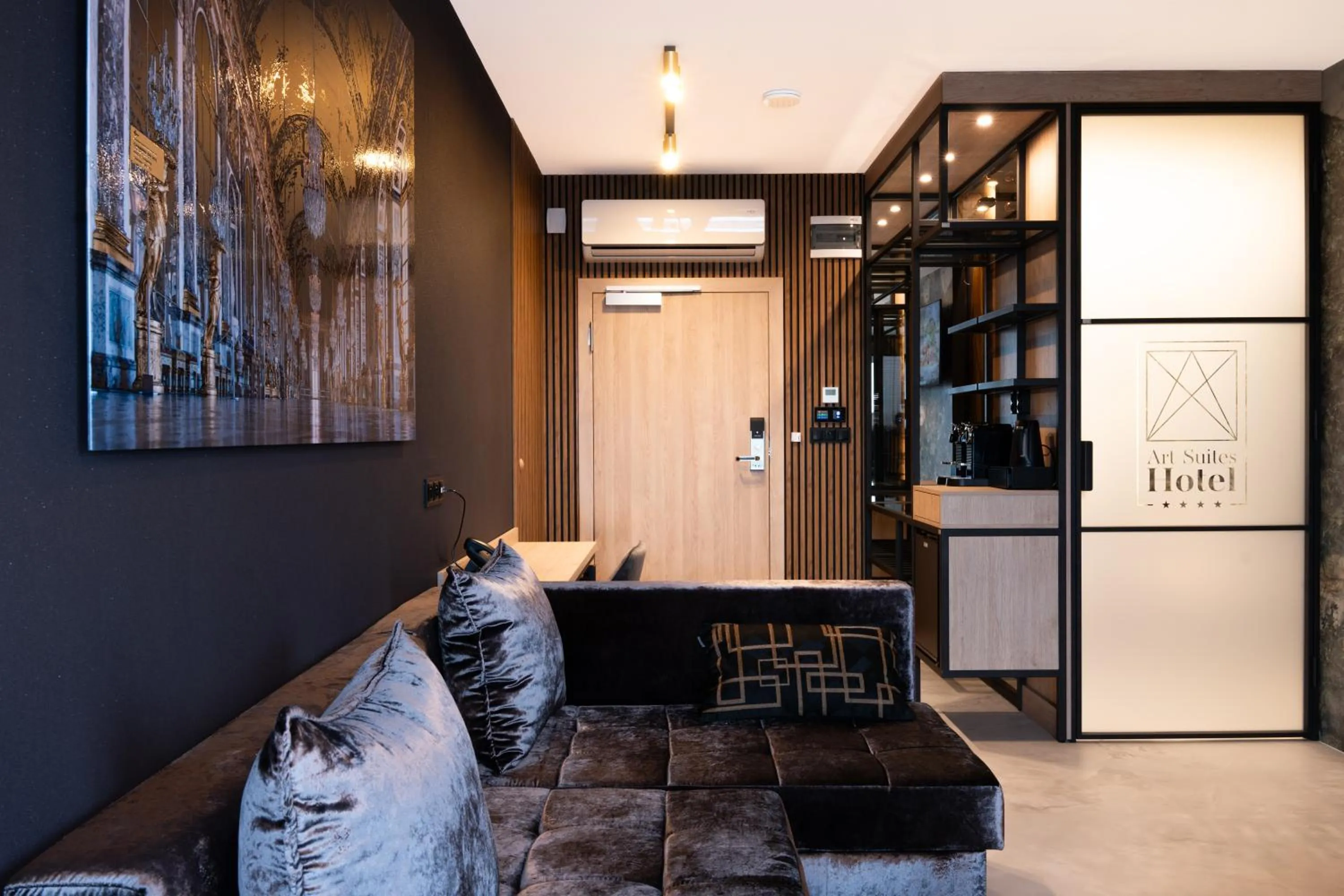 Seating area in Art Suites Luxury Hotel