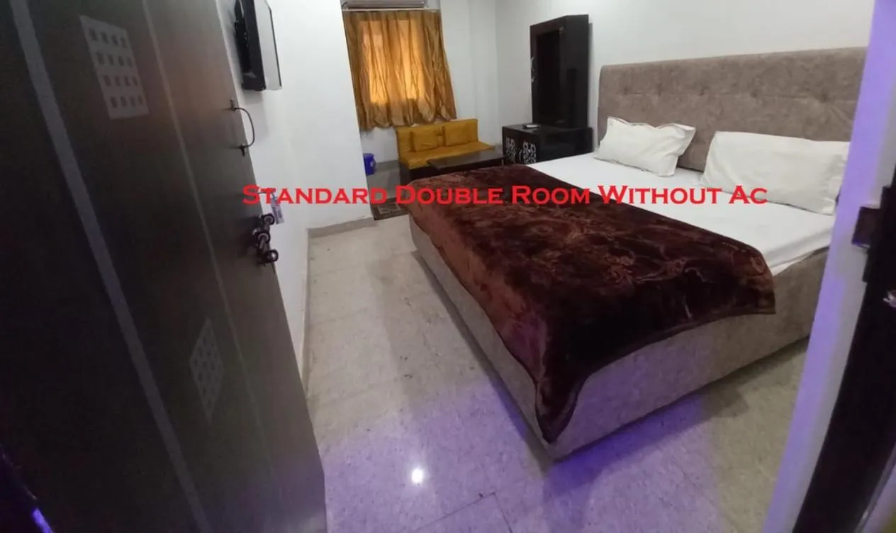 Bed in Hotel Metro Regency