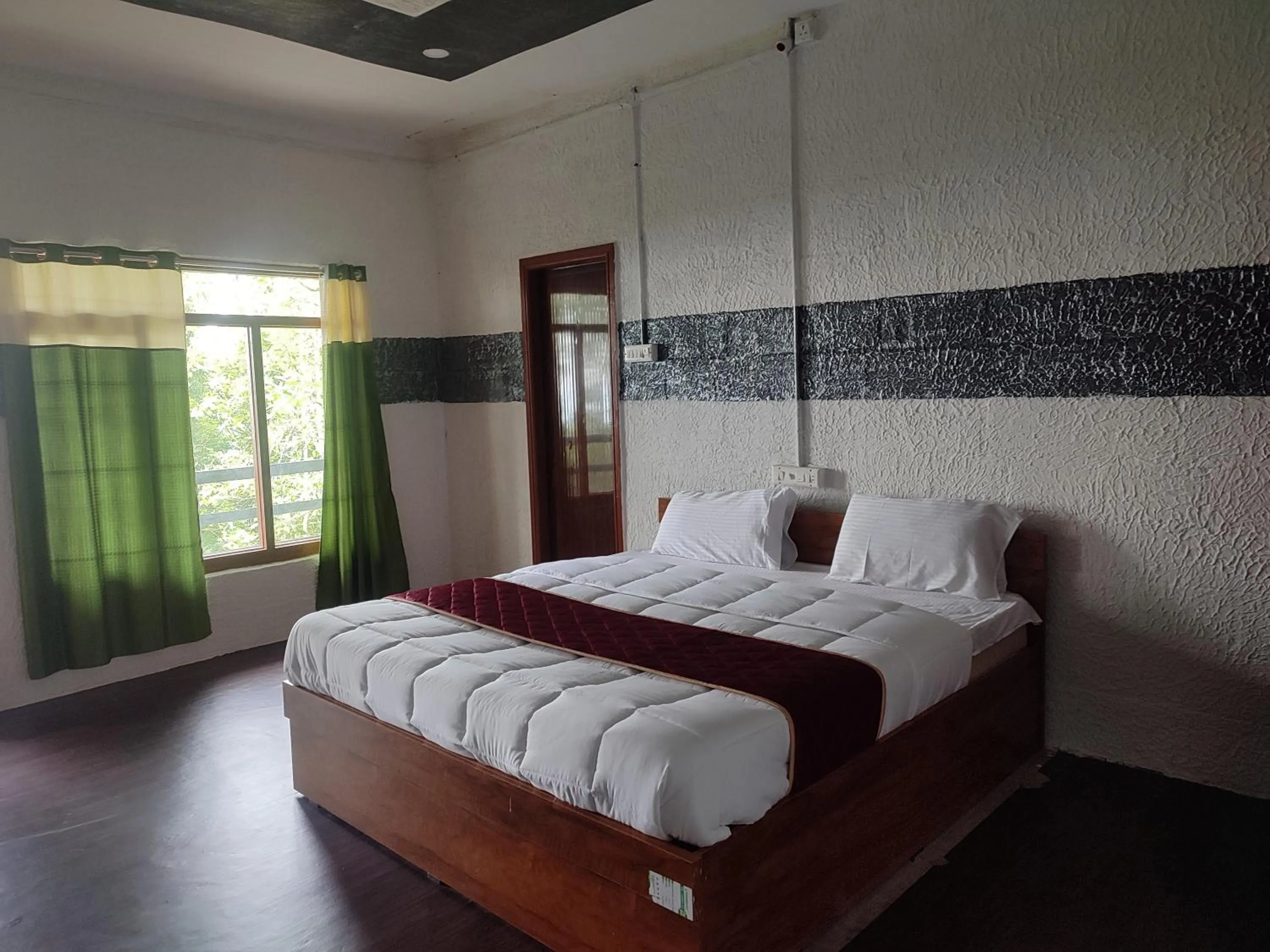 Bed in Cholai Resorts & Hotels