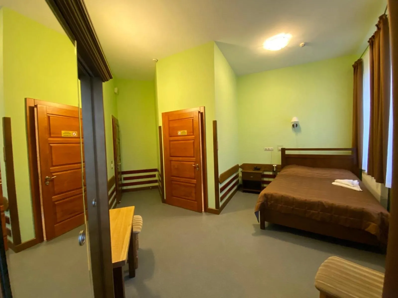 Bed in Tisa Hotel