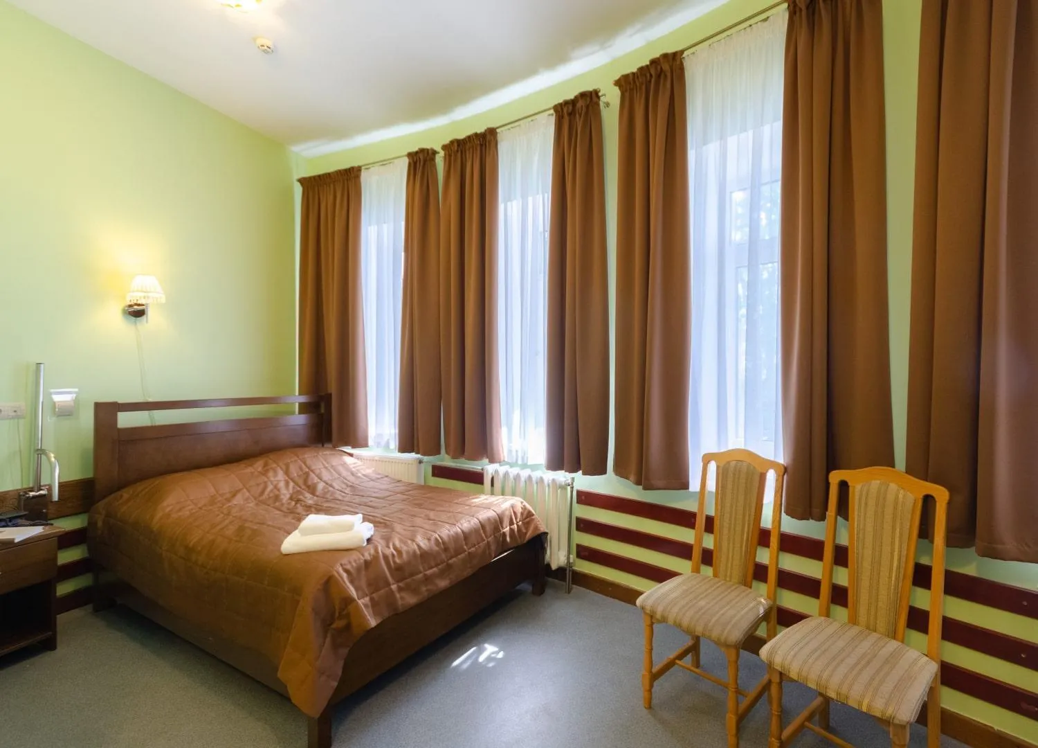 Bed in Tisa Hotel