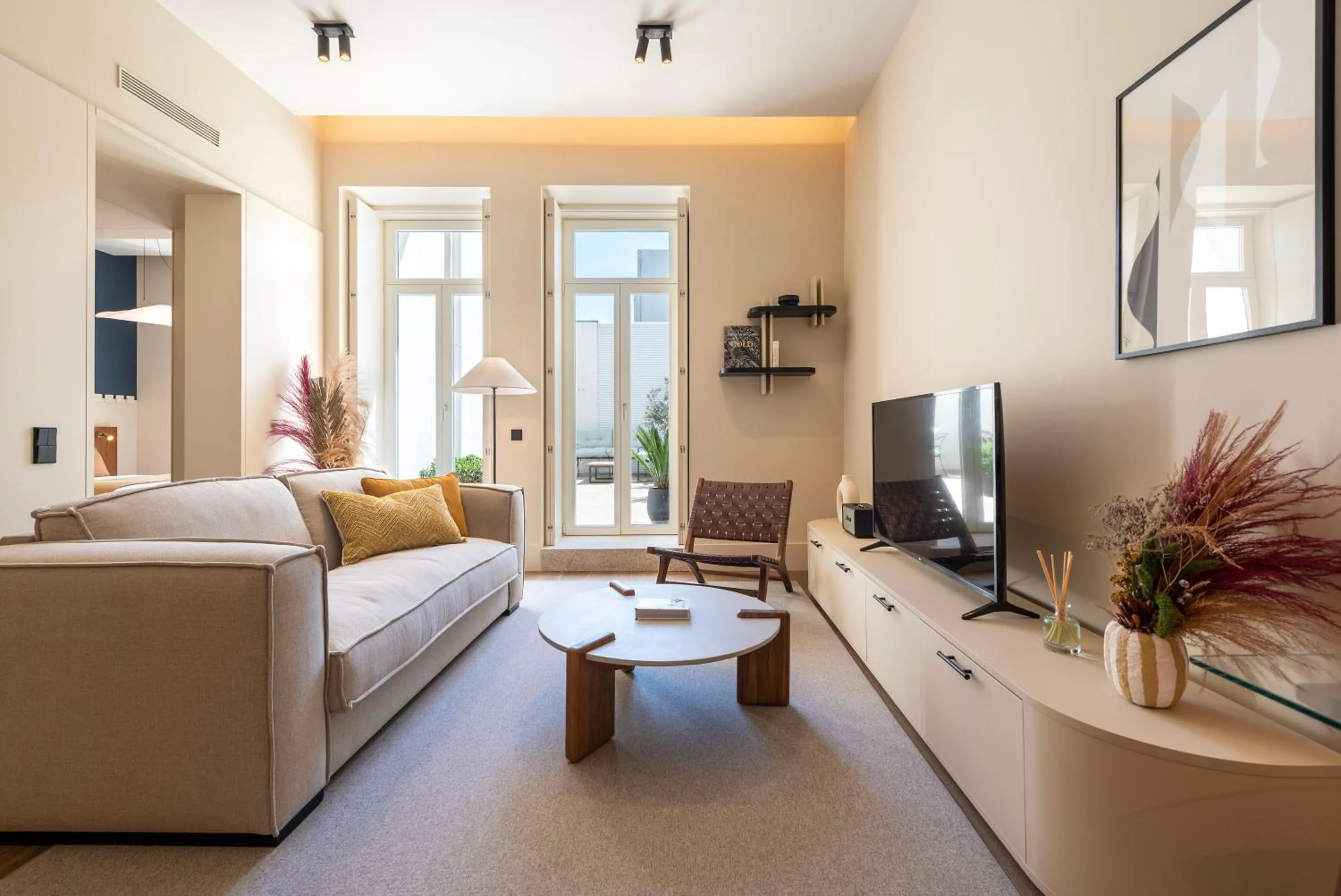 Communal lounge/ TV room in Ando Living - Santa Catarina House
