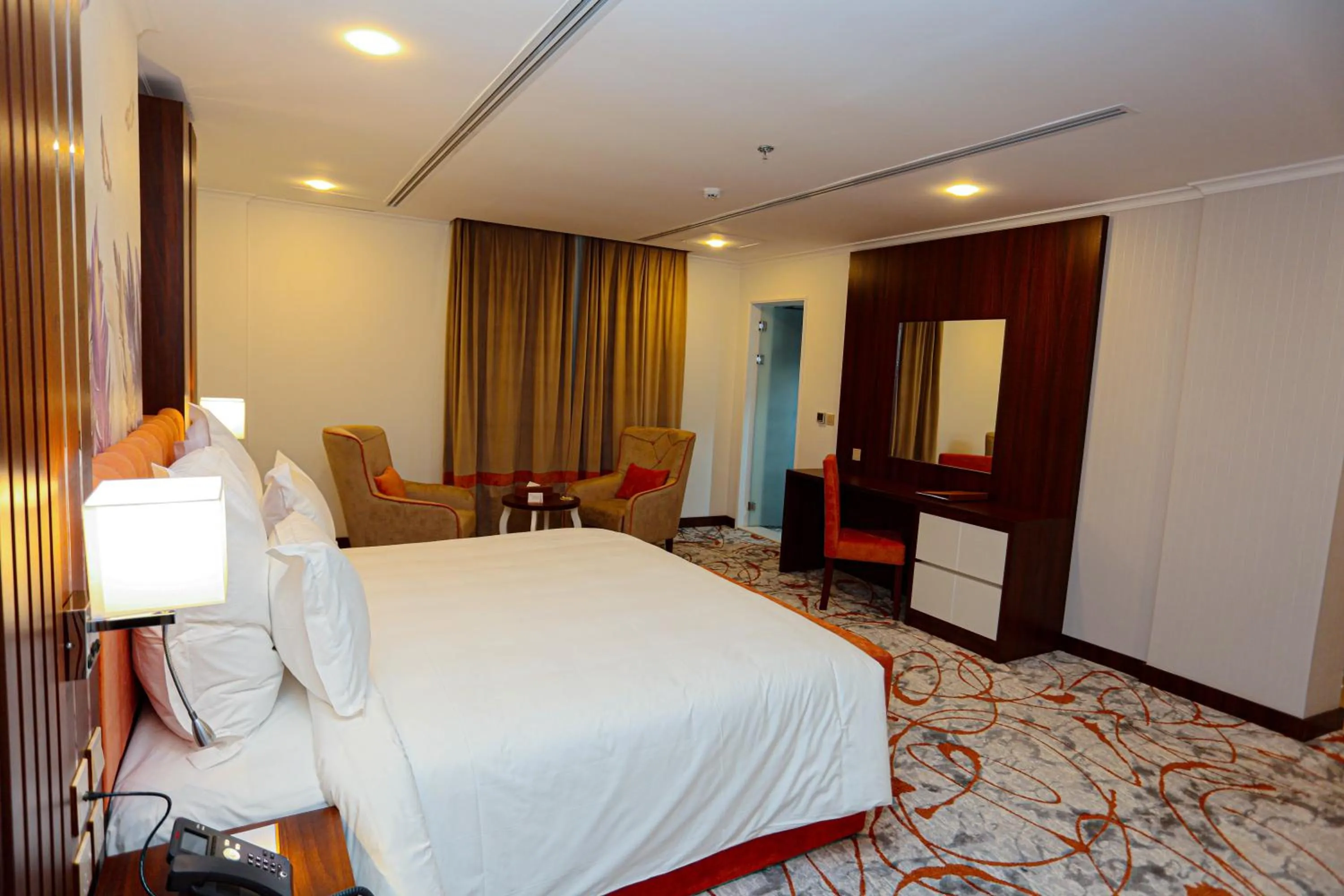 Bedroom in Tulip Plaza By LPC Hotels & Resorts