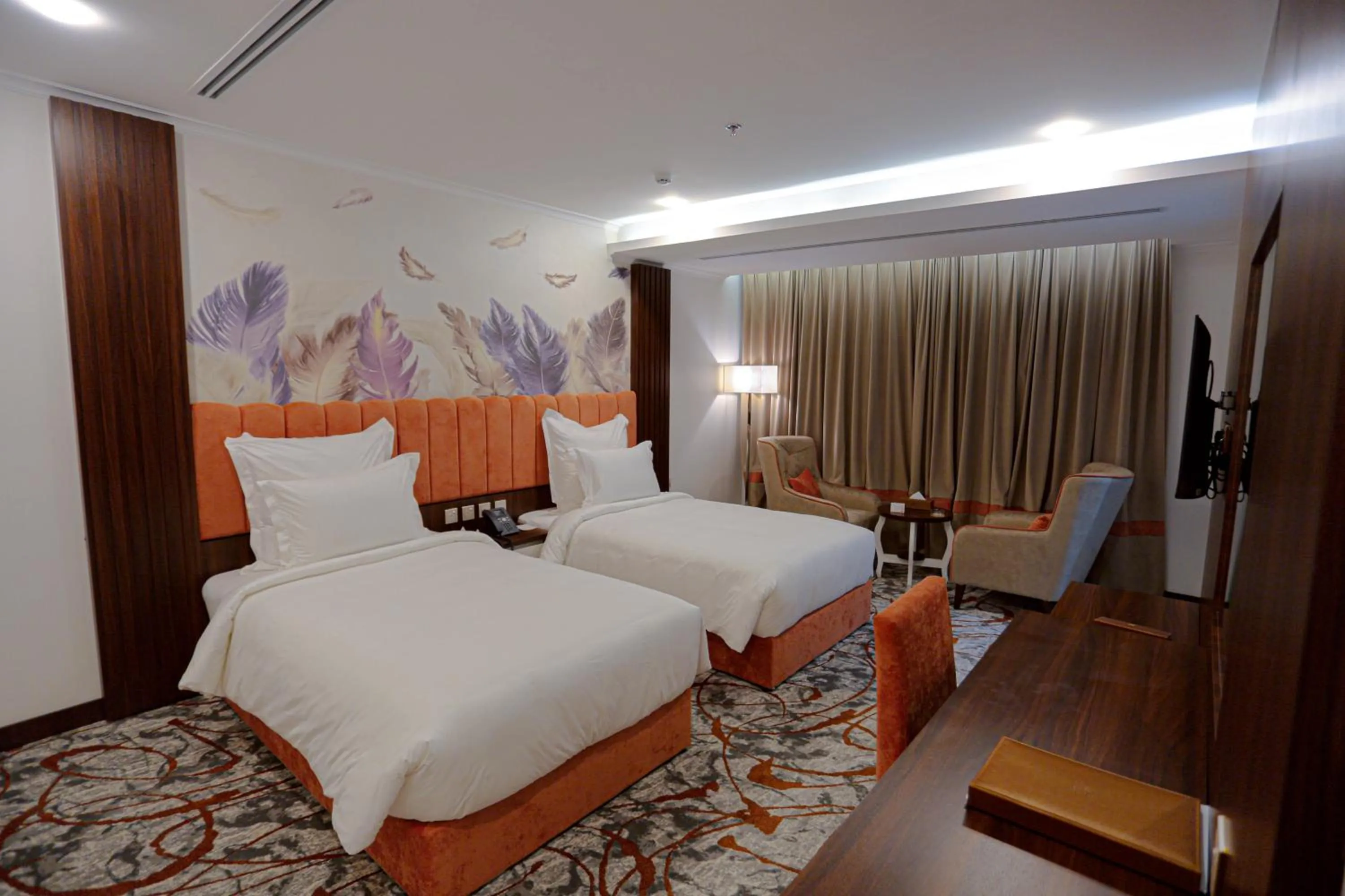 Bed in Tulip Plaza By LPC Hotels & Resorts