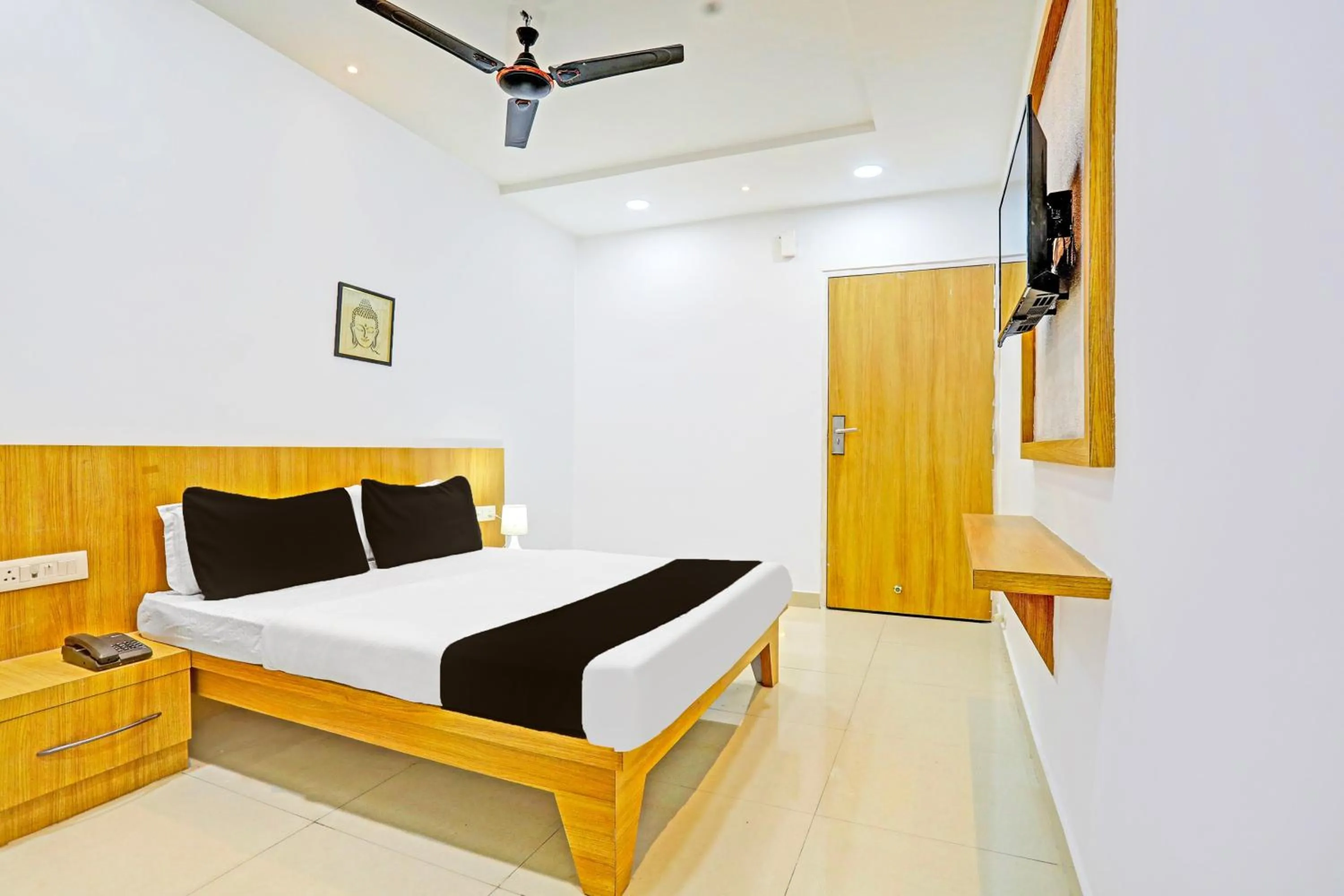 Bedroom, Bed in Super Hotel O Raipur