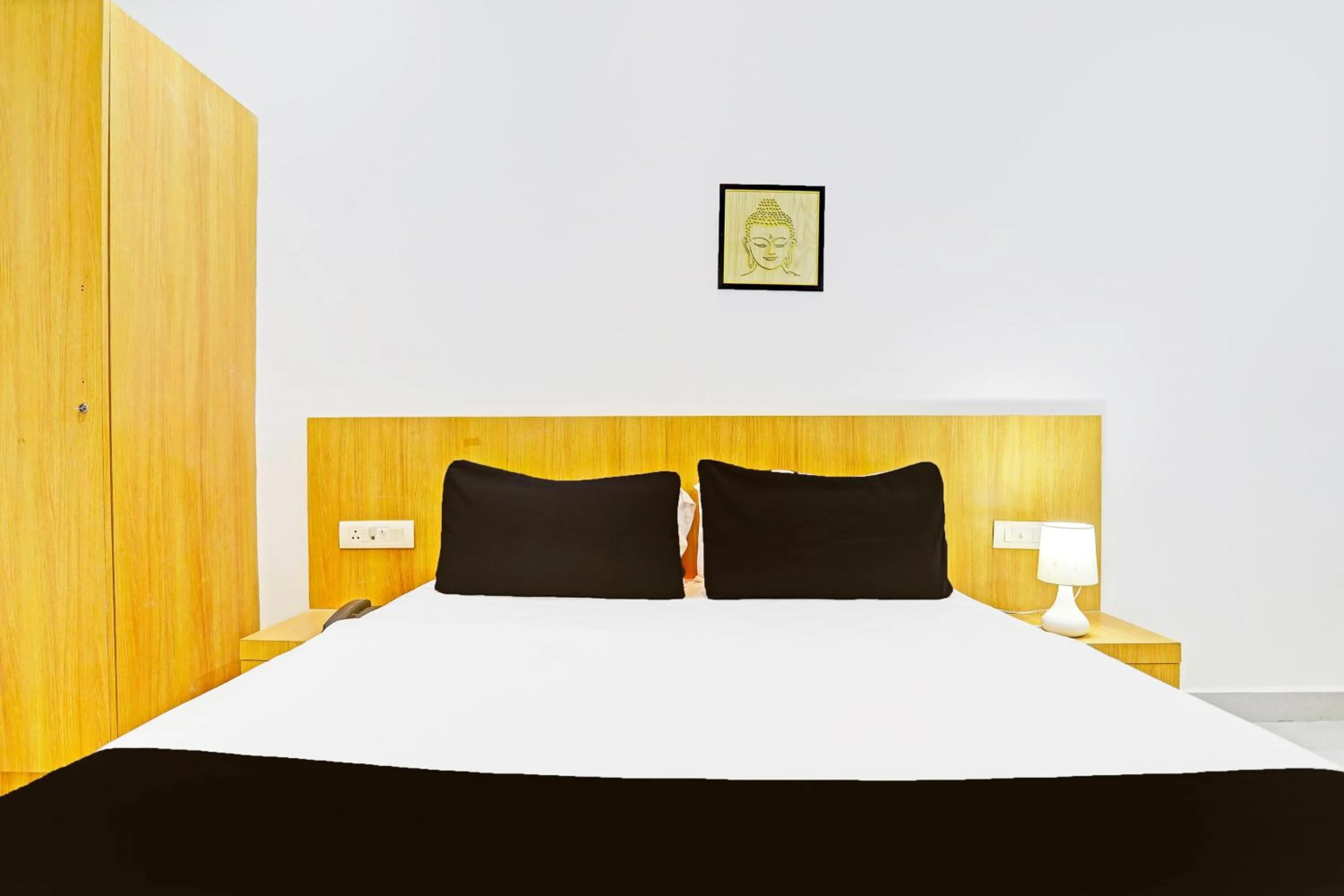 Bedroom, Bed in Super Hotel O Raipur