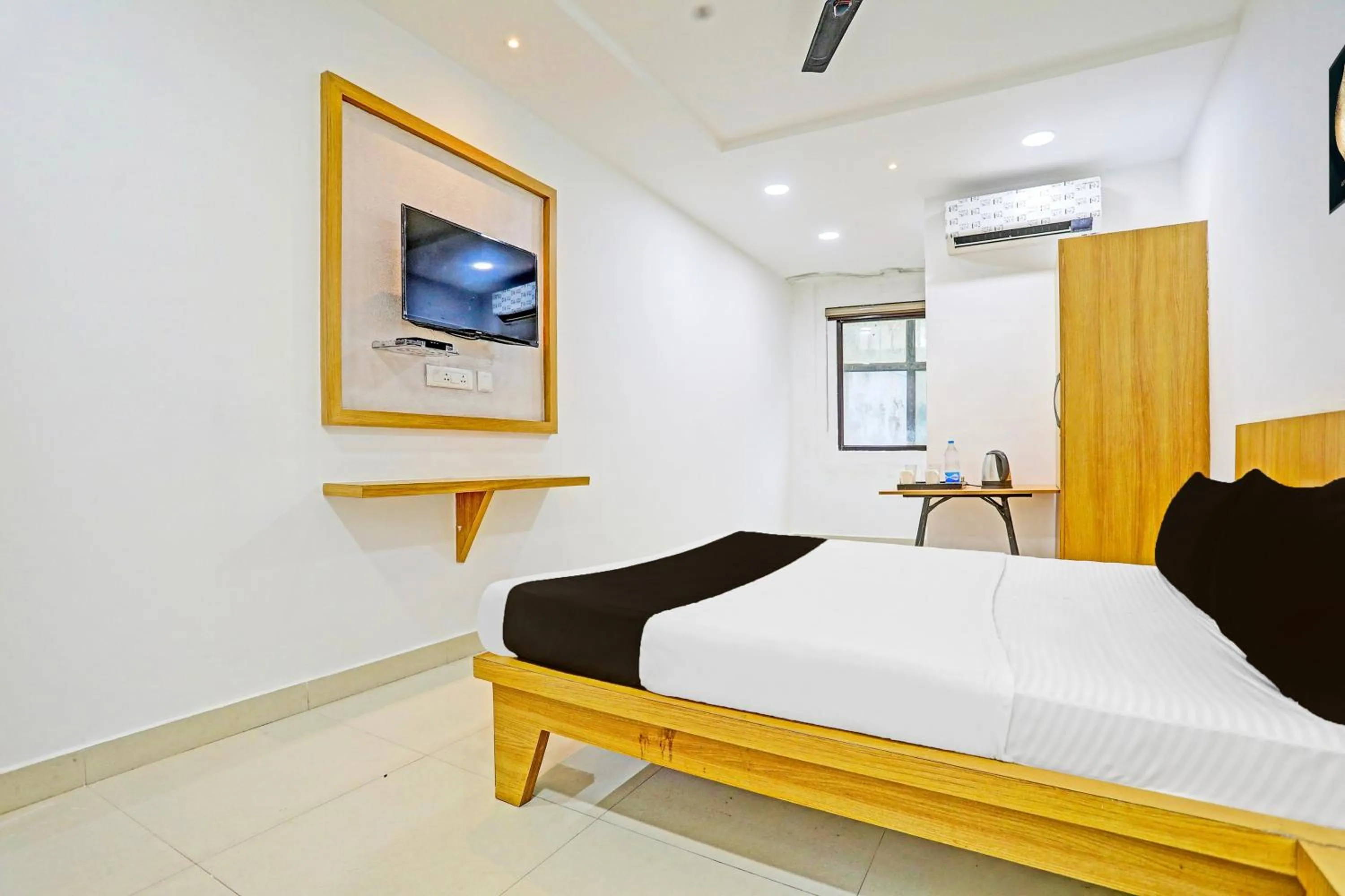 Bedroom, Bed in Super Hotel O Raipur