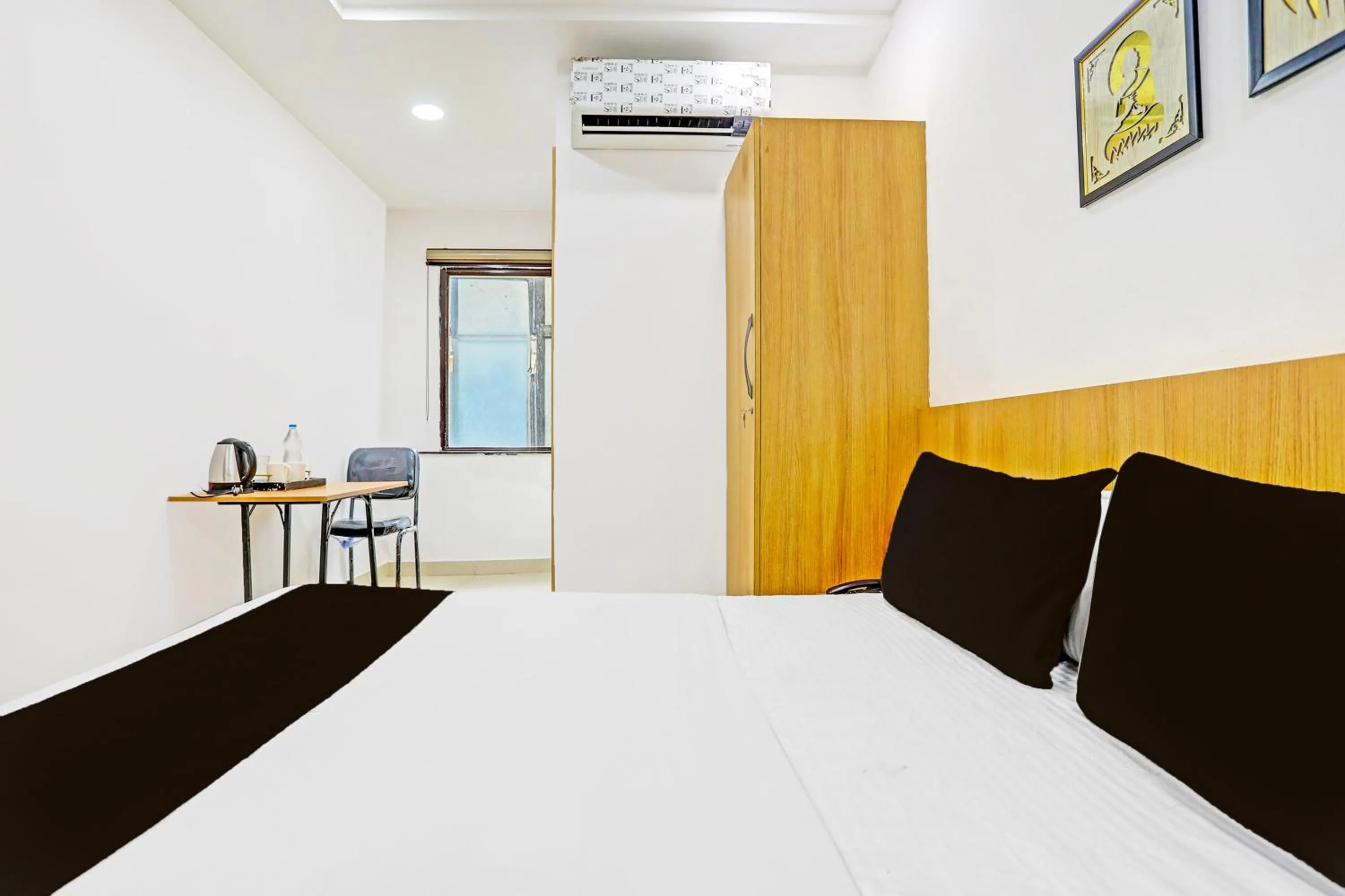 Bedroom, Bed in Super Hotel O Raipur